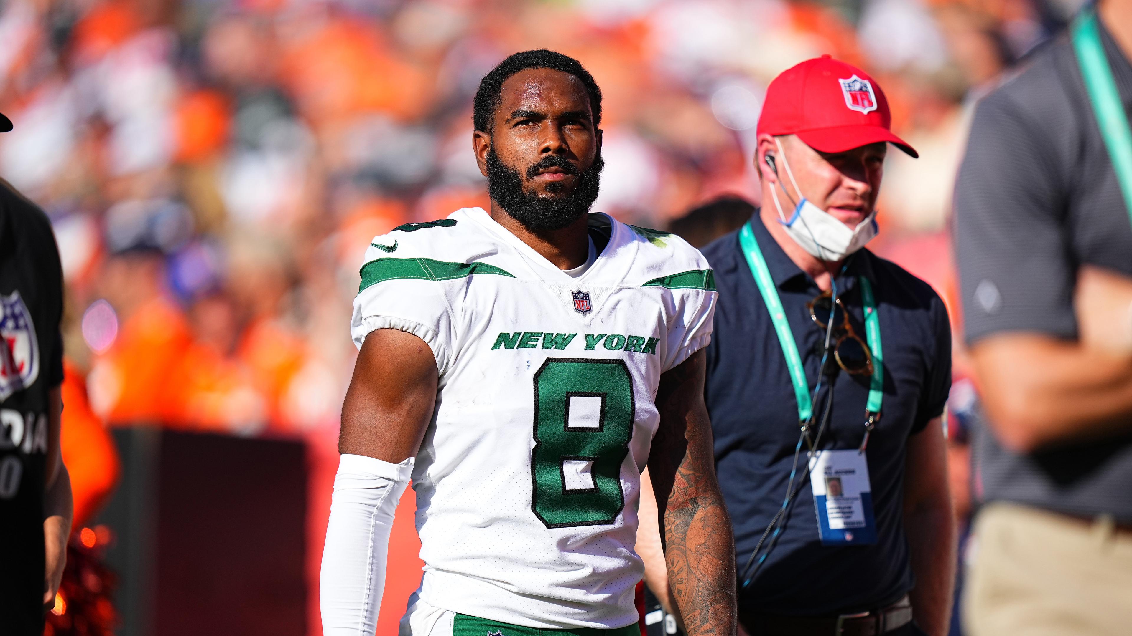 New York Jets wide receiver Elijah Moore (8) leaves the field in the second half against the Denver Broncos at Empower Field at Mile High.