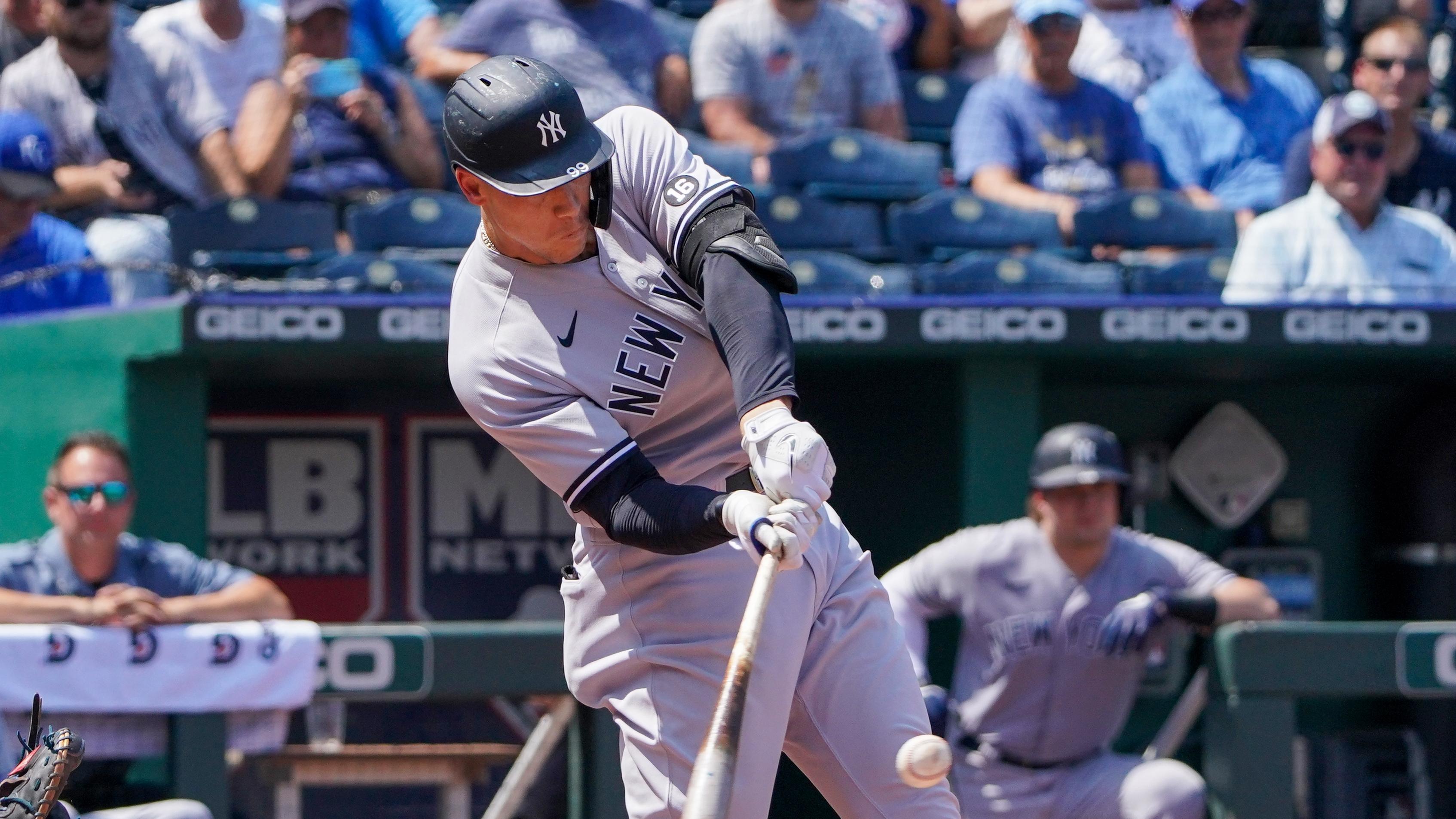 New York Yankees designated hitter Aaron Judge (99) connects for a single in the fourth inning against the Kansas City Royals at Kauffman Stadium.