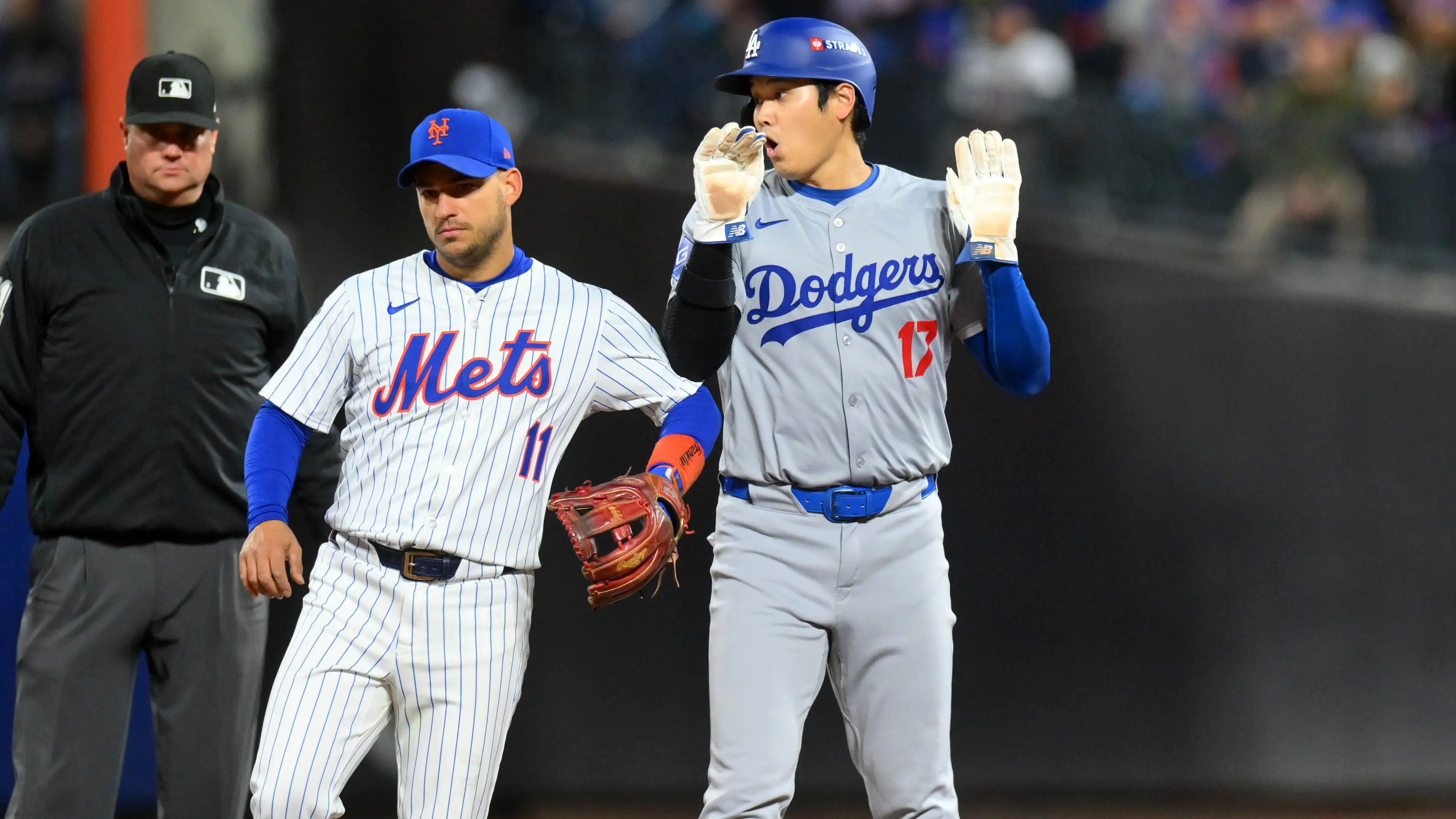 Los Angeles Dodgers two-way player Shohei Ohtani (17) reacts in the third inning during game four of the NLCS for the 2024 MLB playoffs at Citi Field / John Jones - Imagn Images