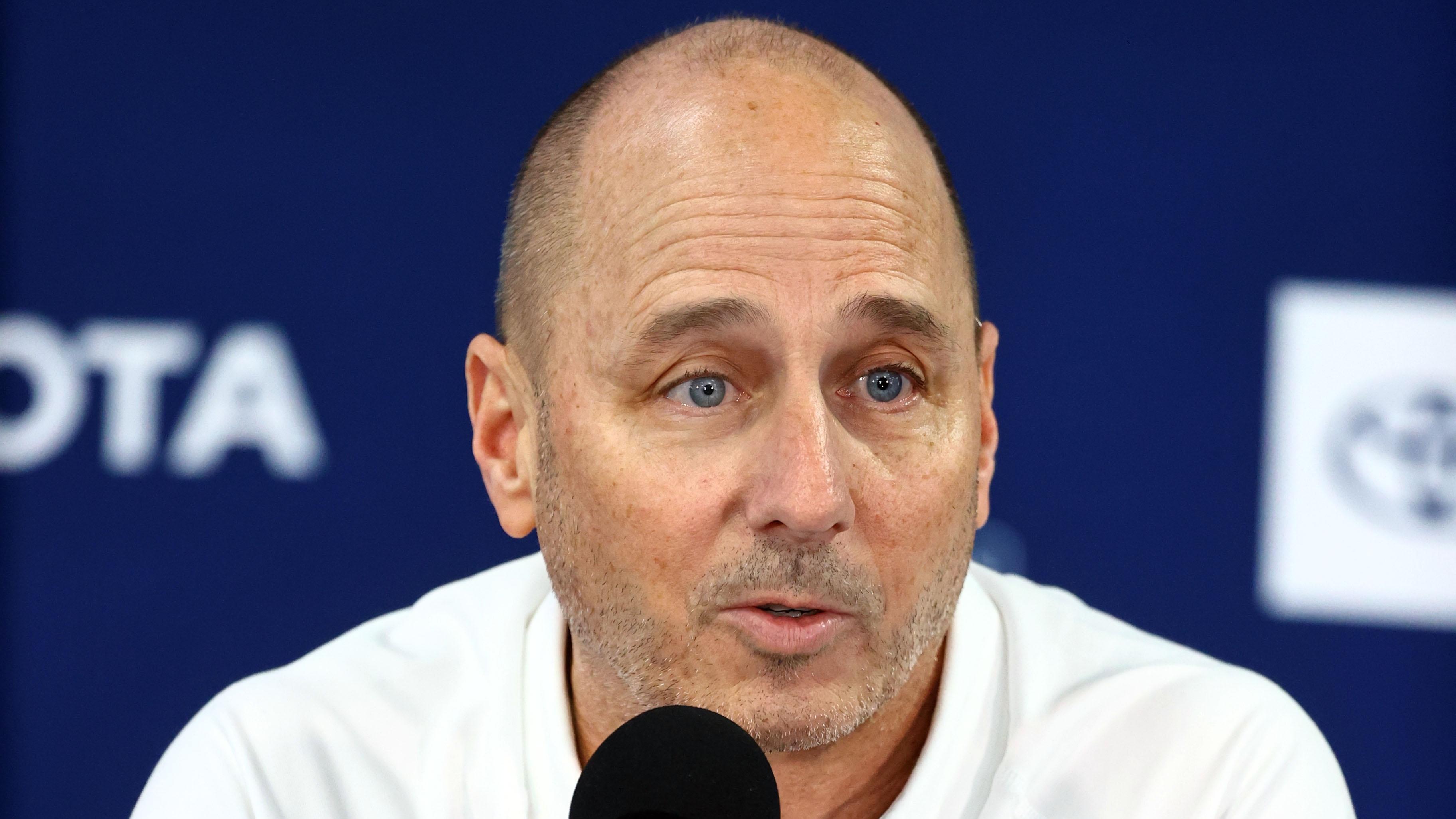 Mar 14, 2022; Tampa, FL, USA; New York Yankees general manager Brian Cashman talks with media during spring training workouts at George M. Steinbrenner Field. Mandatory Credit: Kim Klement-USA TODAY Sports