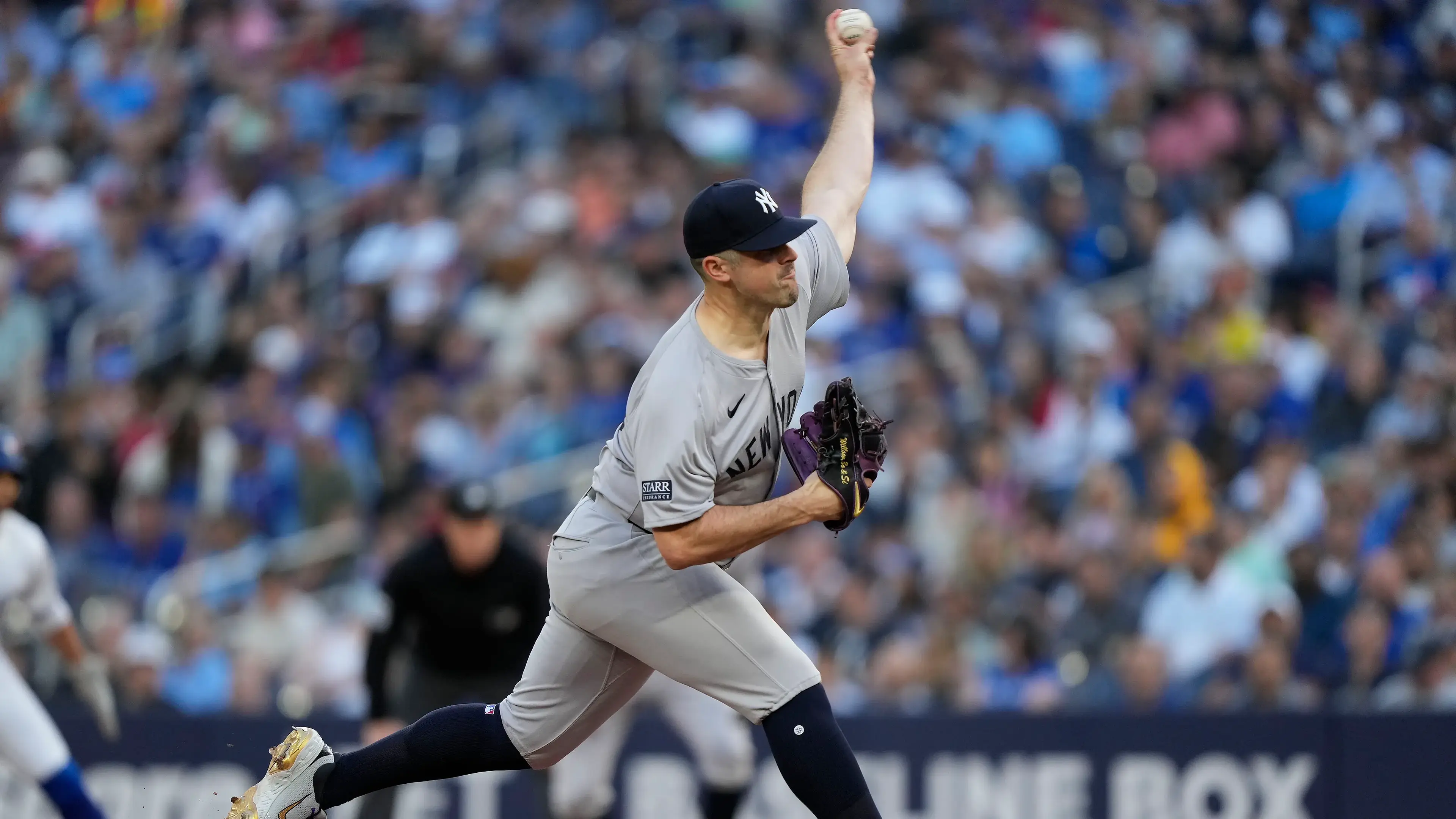 New York Yankees starting pitcher Carlos Rodon (55) pitches to the Toronto Blue Jays during the first inning at Rogers Centre. / John E. Sokolowski-USA TODAY Sports