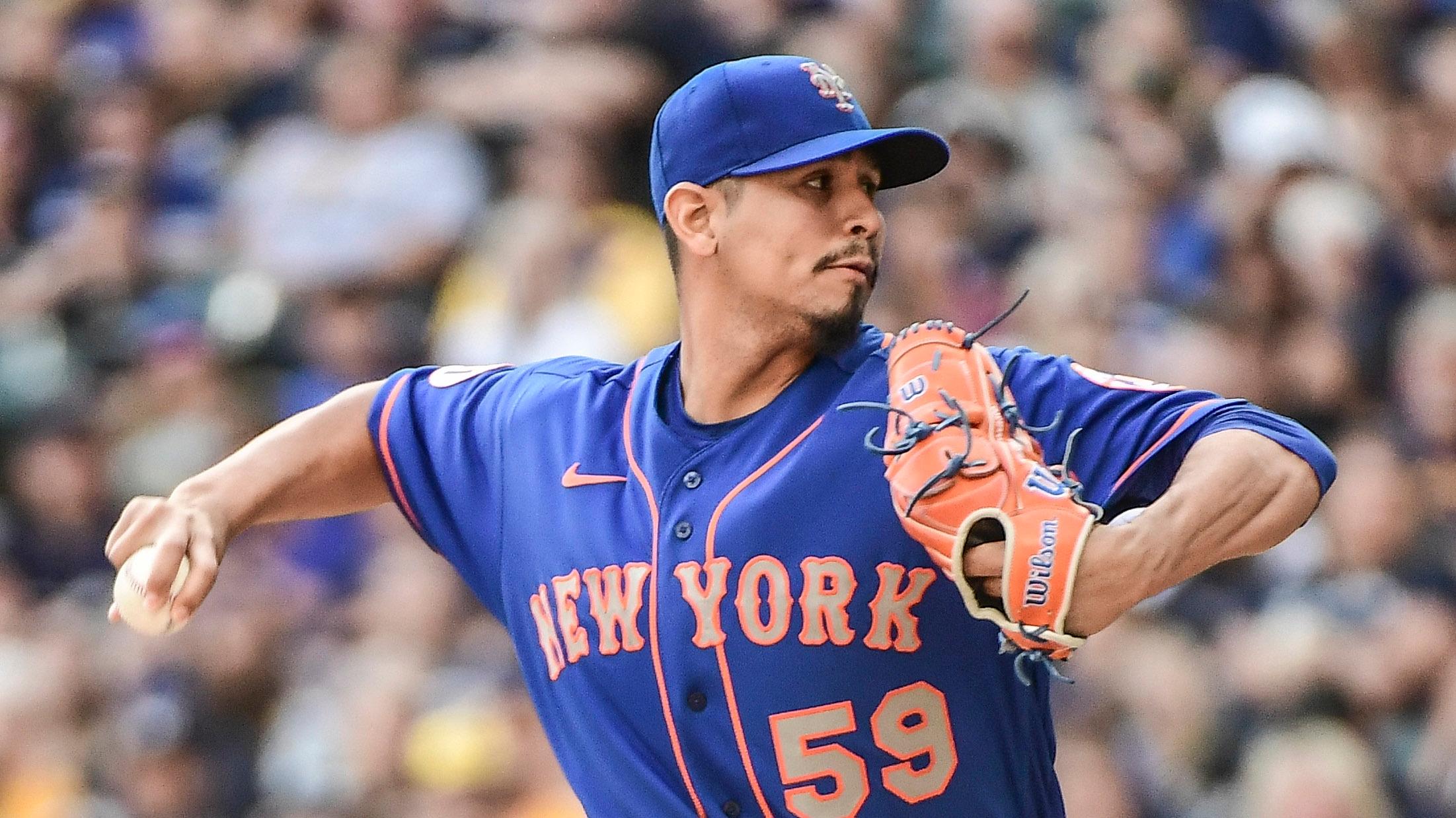 New York Mets pitcher Carlos Carrasco (59) throws a pitch in the first inning against the Milwaukee Brewers at American Family Field.