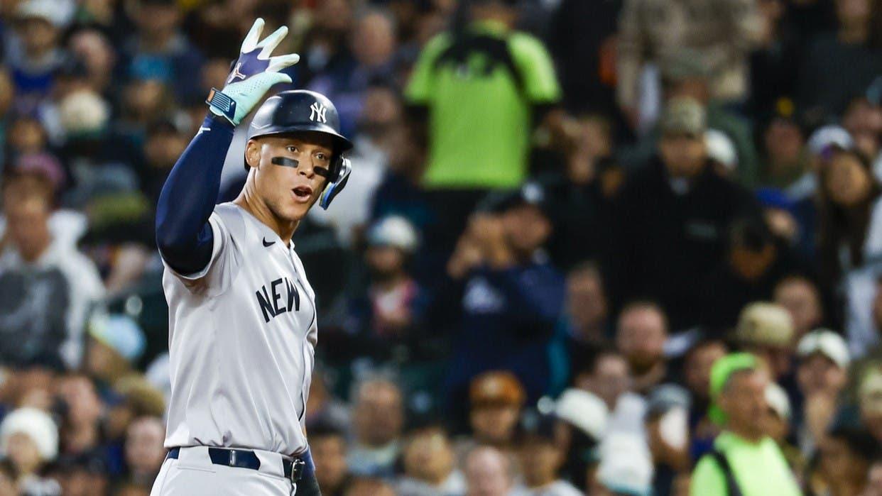 Sep 17, 2024; Seattle, Washington, USA; New York Yankees designated hitter Aaron Judge (99) reacts towards the Yankee dugout after hitting a tow-run single against the Seattle Mariners during the second inning at T-Mobile Park. / Joe Nicholson-Imagn Images