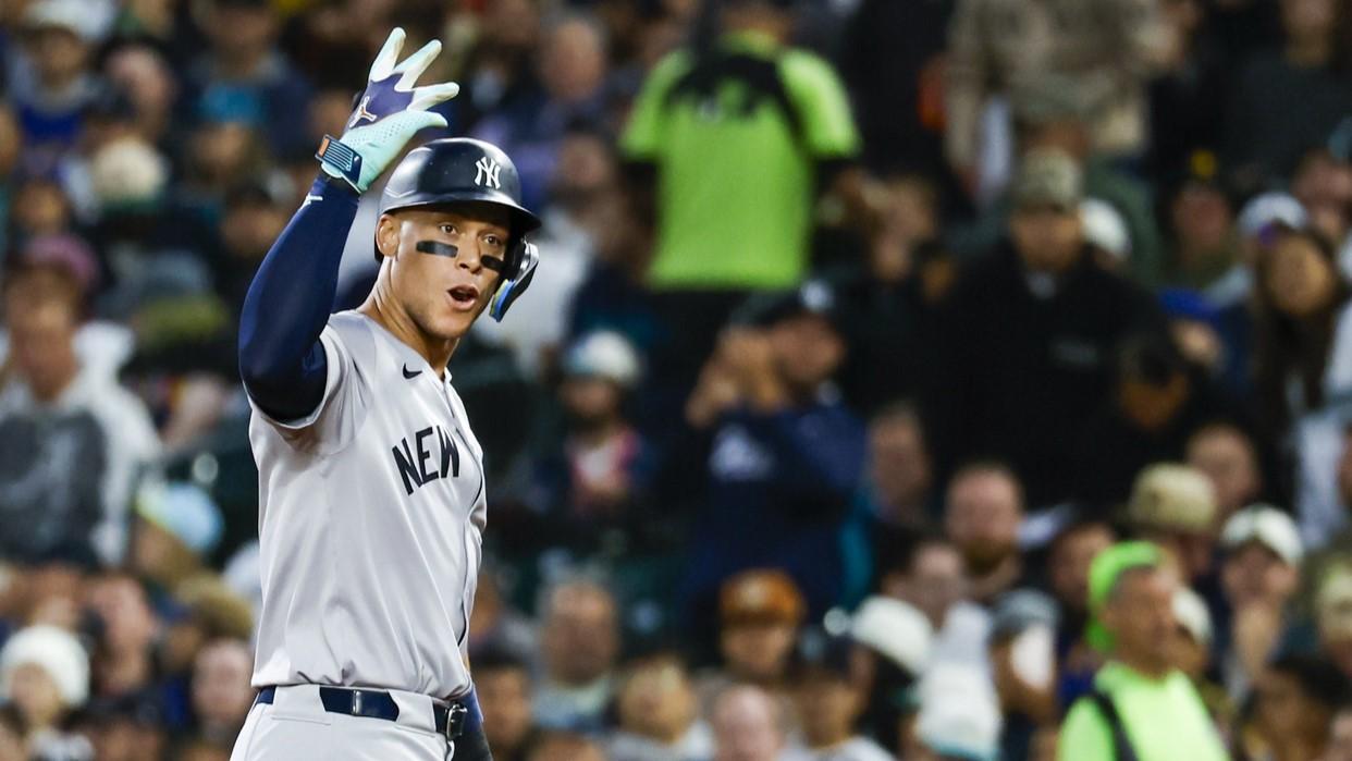 Sep 17, 2024; Seattle, Washington, USA; New York Yankees designated hitter Aaron Judge (99) reacts towards the Yankee dugout after hitting a tow-run single against the Seattle Mariners during the second inning at T-Mobile Park.