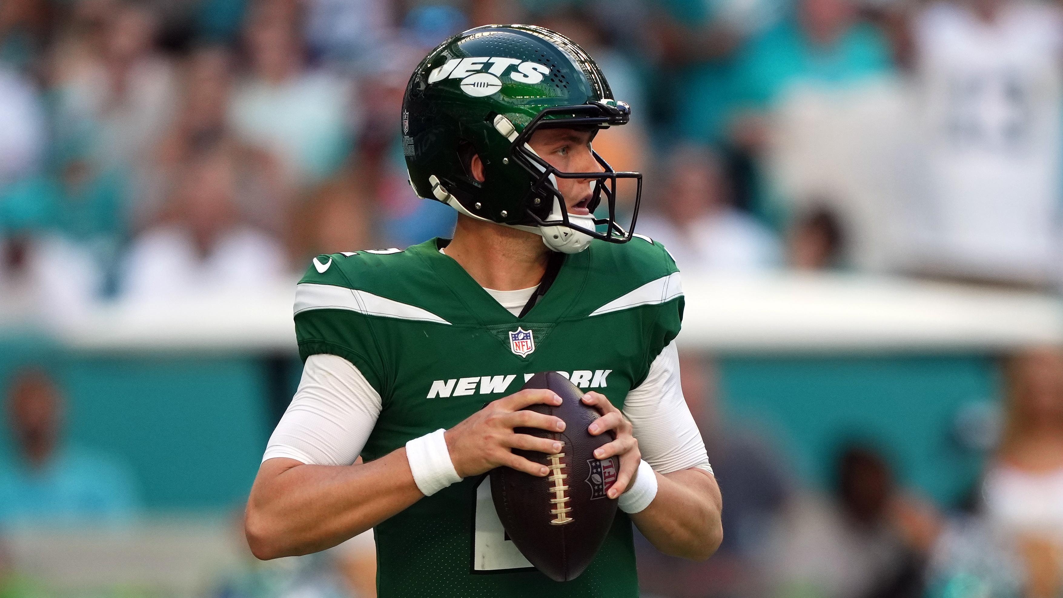 Dec 17, 2023; Miami Gardens, Florida, USA; New York Jets quarterback Zach Wilson (2) drops back to attempt a pass against the Miami Dolphins during the first half at Hard Rock Stadium.