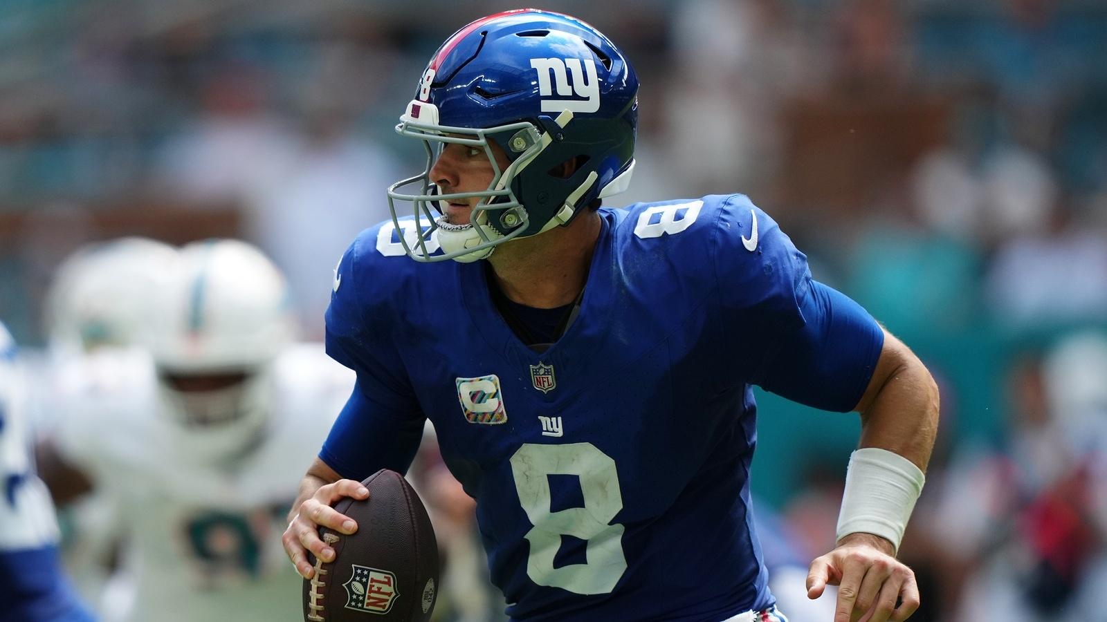 Oct 8, 2023; Miami Gardens, Florida, USA; New York Giants quarterback Daniel Jones (8) scrambles with the ball agianst the Miami Dolphins during the first half at Hard Rock Stadium.