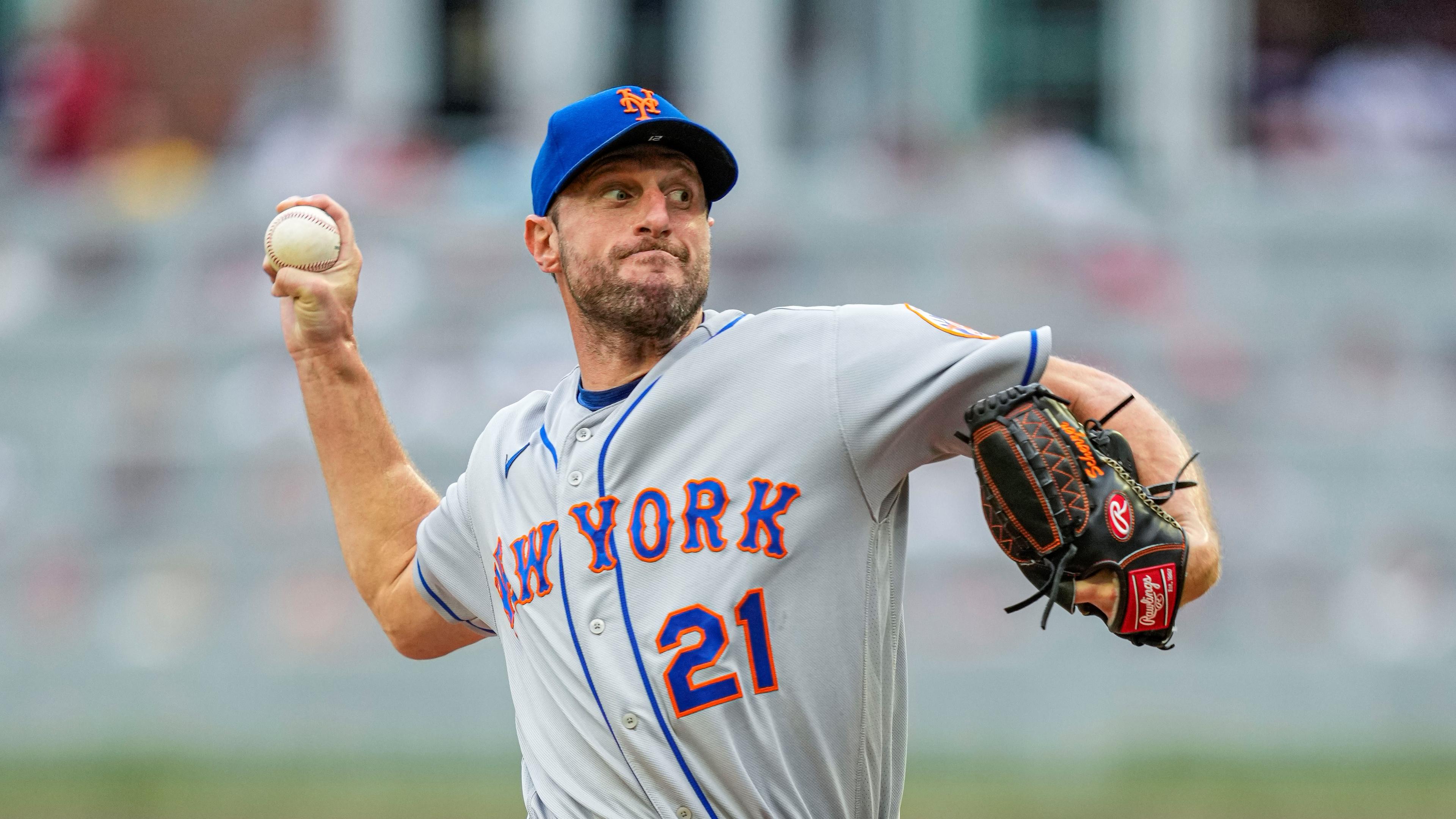 Jul 11, 2022; Cumberland, Georgia, USA; New York Mets starting pitcher Max Scherzer (21) pitches against the Atlanta Braves during the first inning at Truist Park. Mandatory Credit: Dale Zanine-USA TODAY Sports