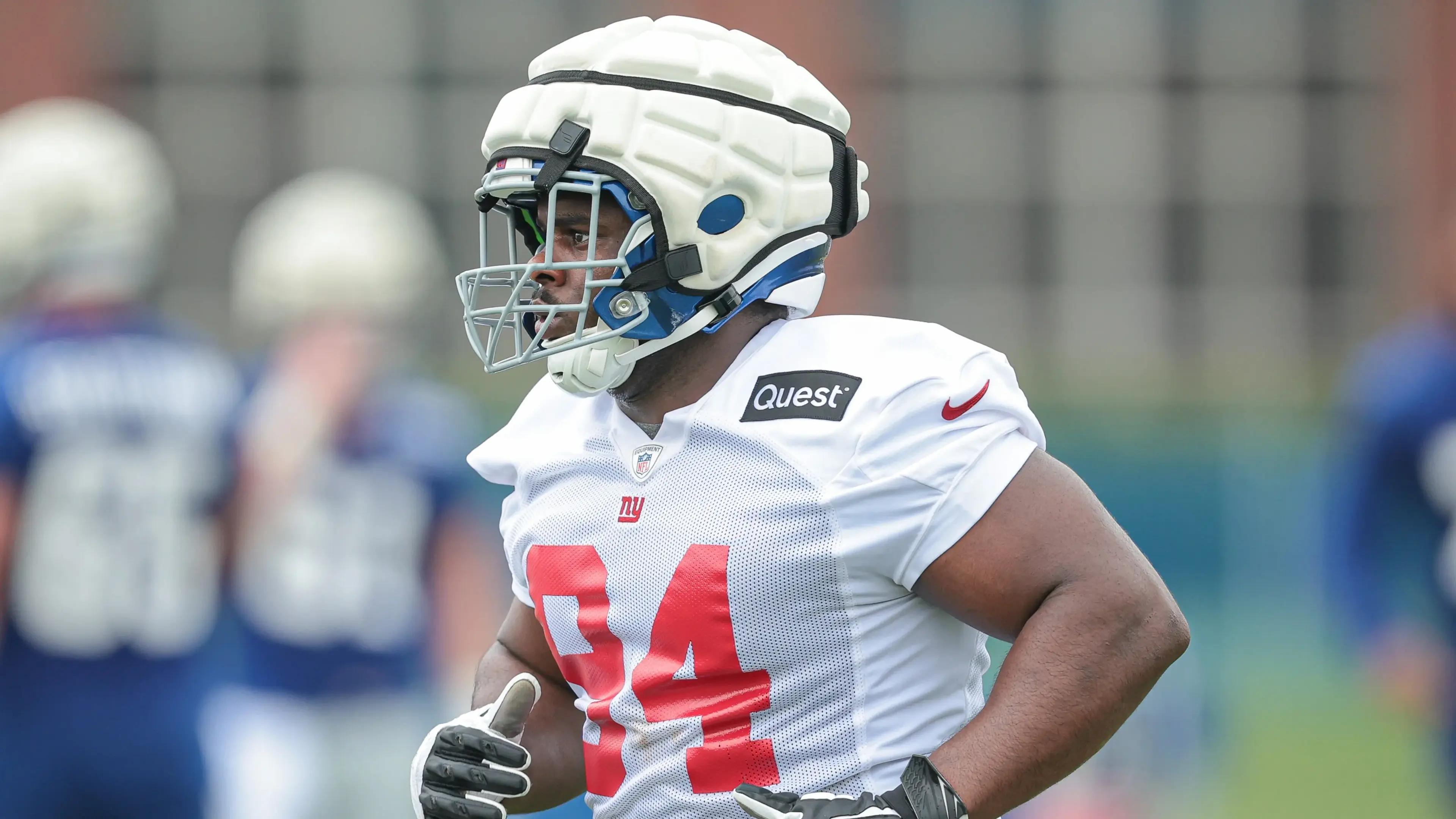 Jul 24, 2024; East Rutherford, NJ, USA; New York Giants defensive tackle Elijah Chatman (94) runs on the field during training camp at Quest Diagnostics Training Facility. Mandatory Credit: Vincent Carchietta-USA TODAY Sports / © Vincent Carchietta-USA TODAY Sports