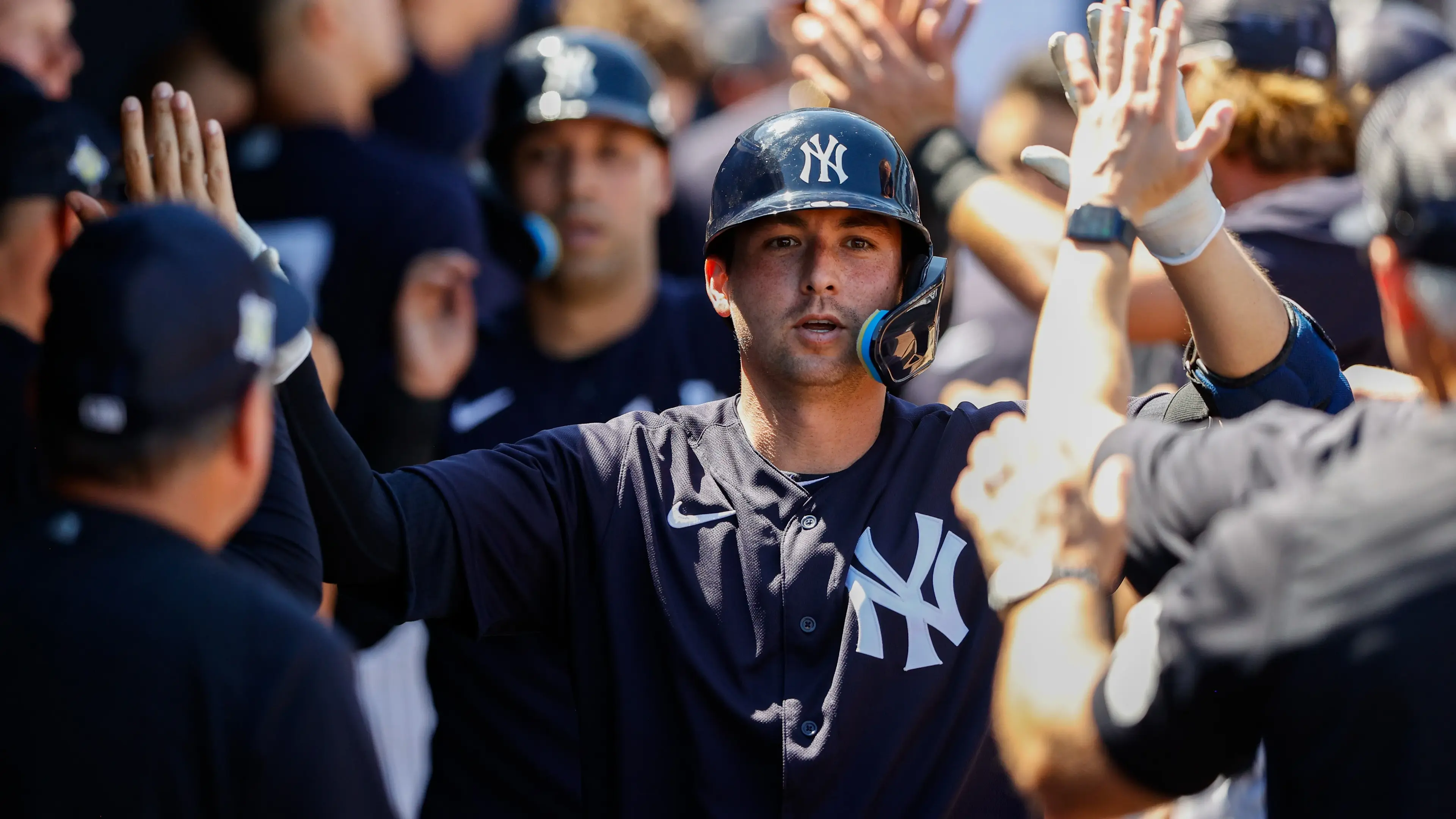 New York Yankees catcher Kyle Higashioka (66) is congratulated after hitting a two run home run in the fifth inning against the Philadelphia Phillies during spring training / Nathan Ray Seebeck-USA TODAY Sports