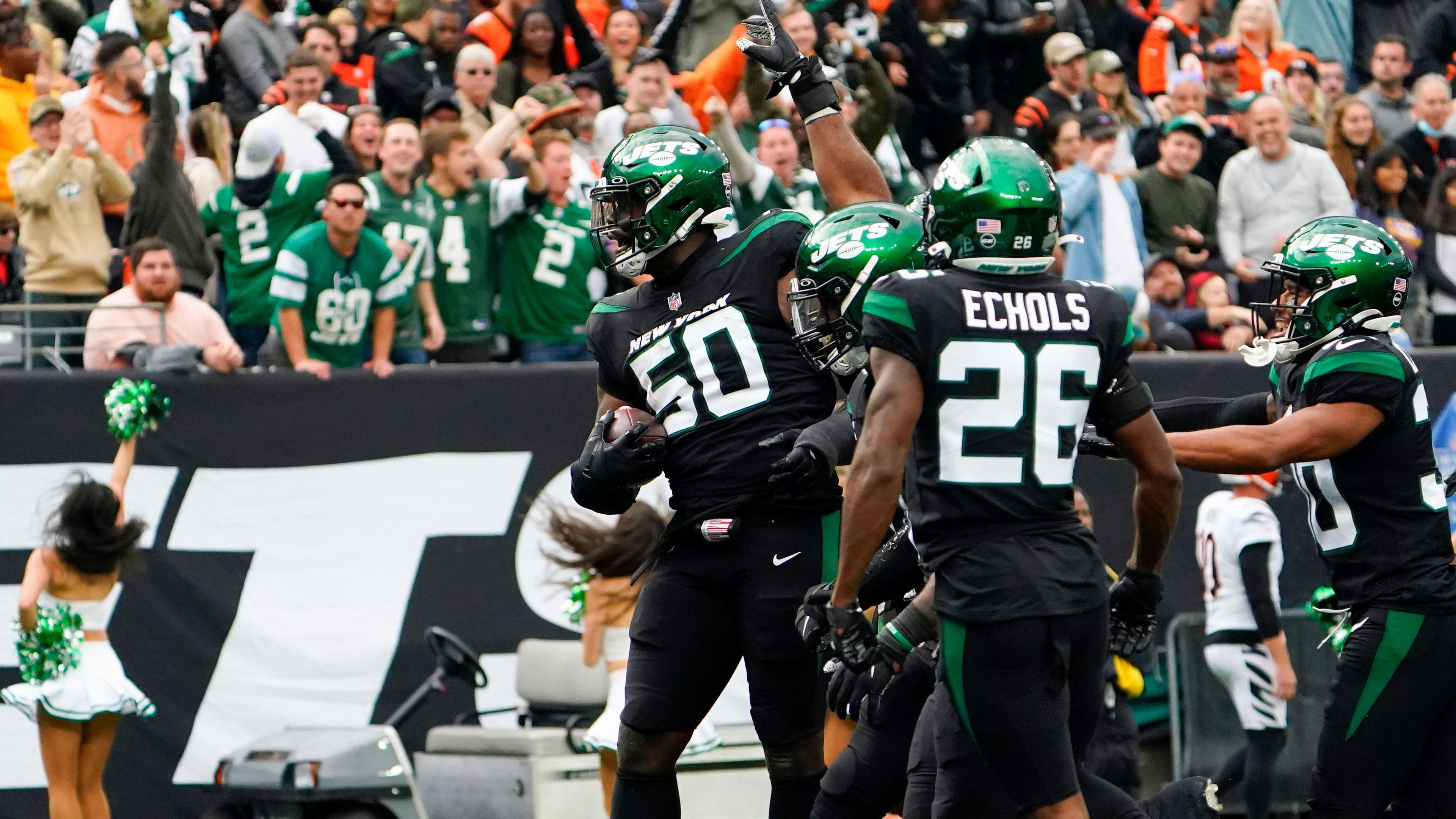 New York Jets defensive end Shaq Lawson (50) reacts after intercepting a pass thrown by Cincinnati Bengals quarterback Joe Burrow (not pictured) in the second half. The Jets defeat the Bengals, 34-31, at MetLife Stadium on Sunday, Oct. 31, 2021, in East Rutherford.