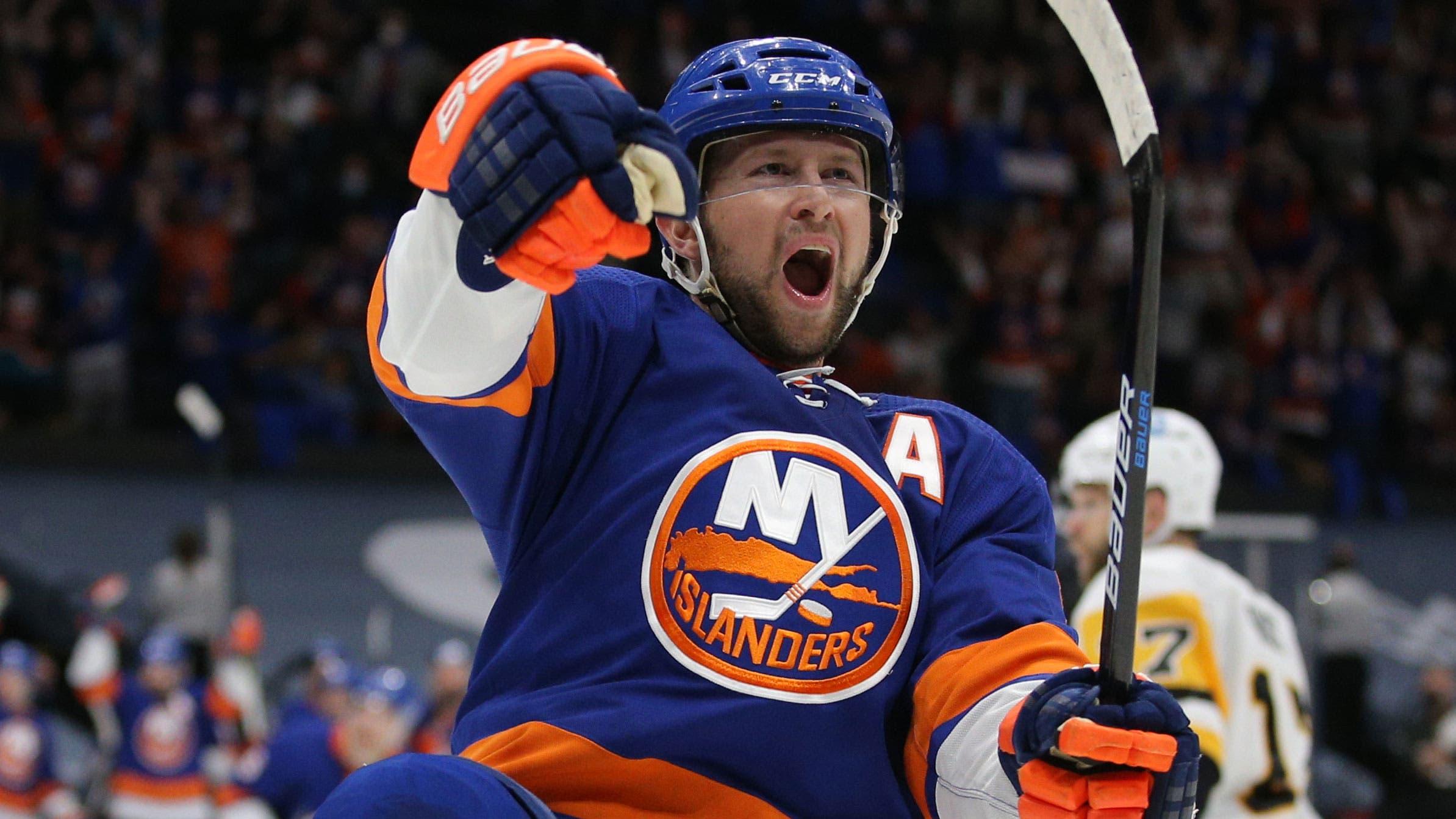 May 22, 2021; Uniondale, New York, USA; New York Islanders center Josh Bailey (12) celebrates his goal against the Pittsburgh Penguins during the second period of game four of the first round of the 2021 Stanley Cup Playoffs at Nassau Veterans Memorial Coliseum. / Brad Penner-USA TODAY Sports