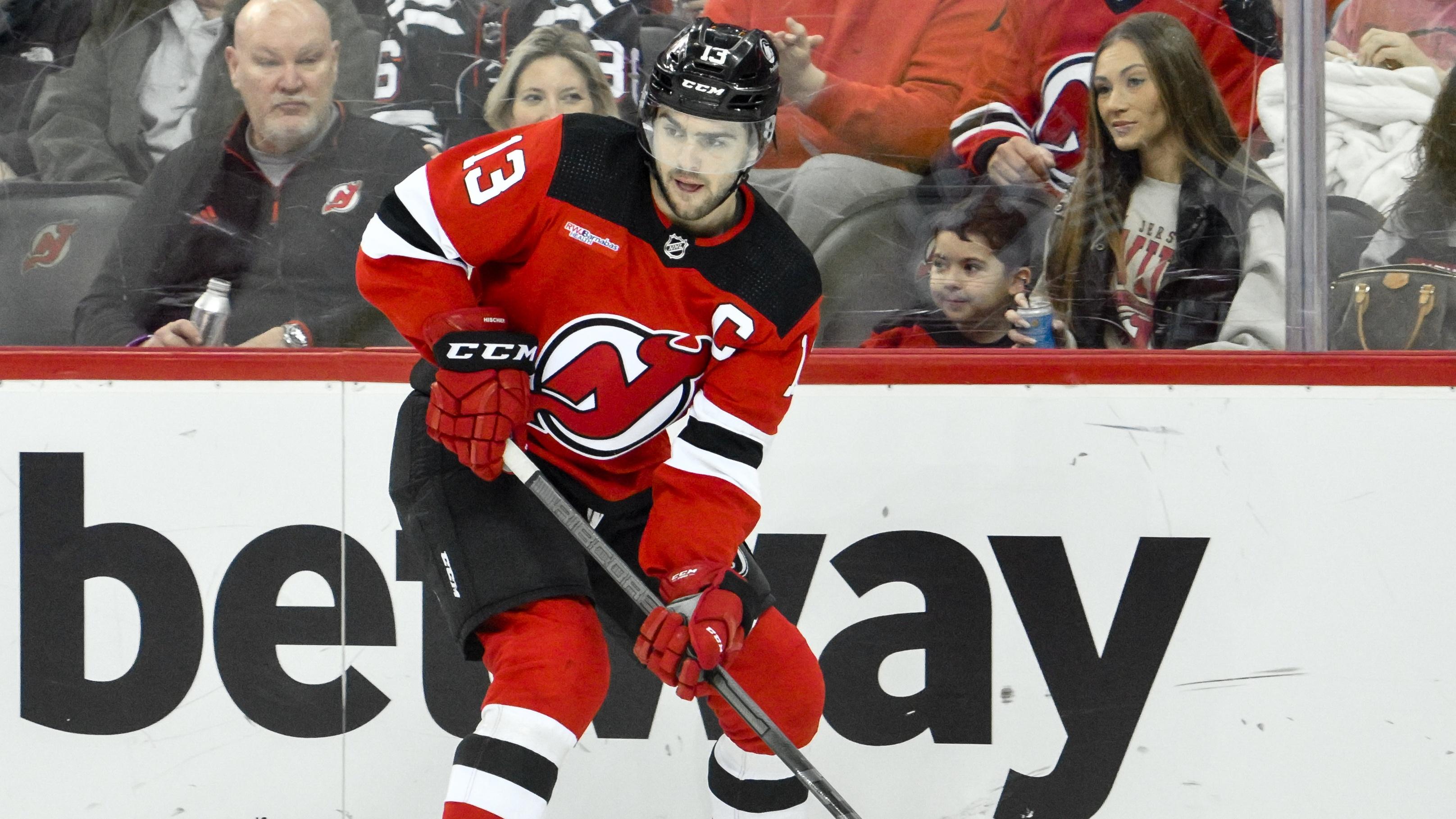 New Jersey Devils center Nico Hischier (13) passes the puck during the second period against the Montreal Canadiens at Prudential Center