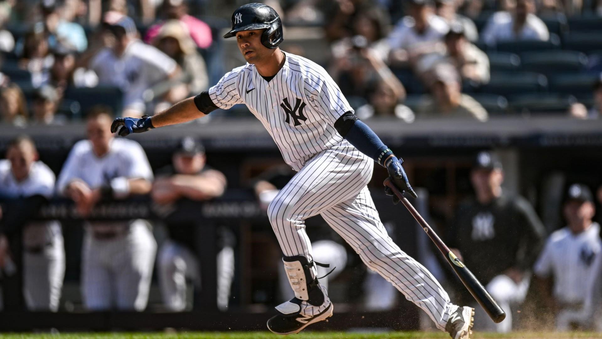 May 27, 2023; Bronx, New York, USA; New York Yankees center fielder Isiah Kiner-Falefa (12) hits a walk off RBI single in the tenth inning against the San Diego Padres at Yankee Stadium.