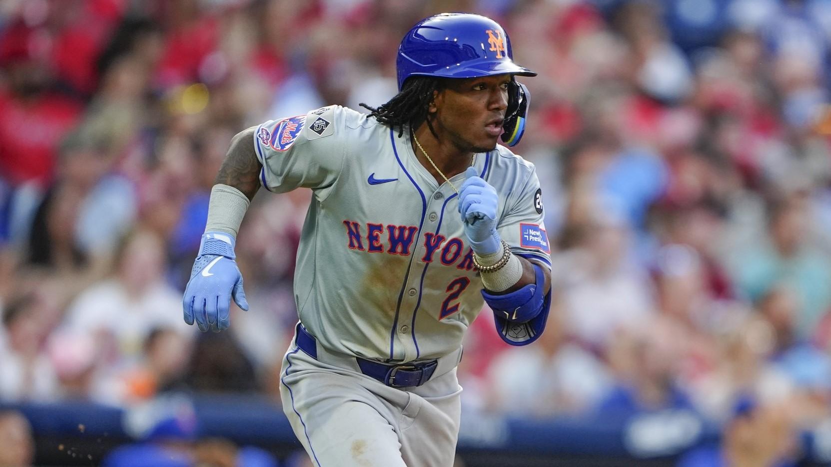 Sep 14, 2024; Philadelphia, Pennsylvania, USA; New York Mets shortstop Luisangel Acuna (2) runs out a single against the Philadelphia Phillies during the ninth inning at Citizens Bank Park. 