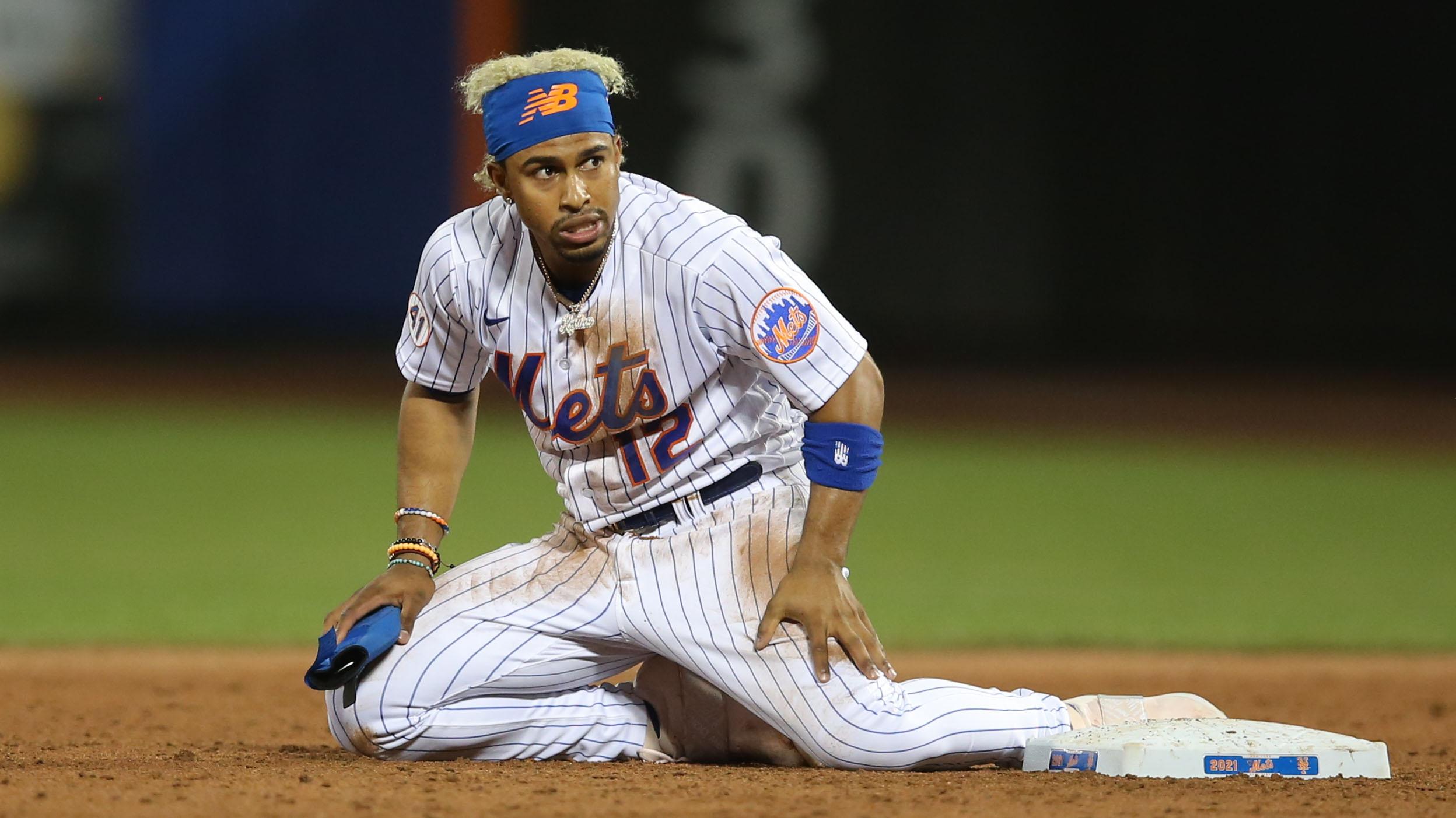 Jun 21, 2021; New York City, New York, USA; New York Mets shortstop Francisco Lindor (12) reacts after being picked off first and caught trying to steal second base against the Atlanta Braves during the sixth inning at Citi Field.