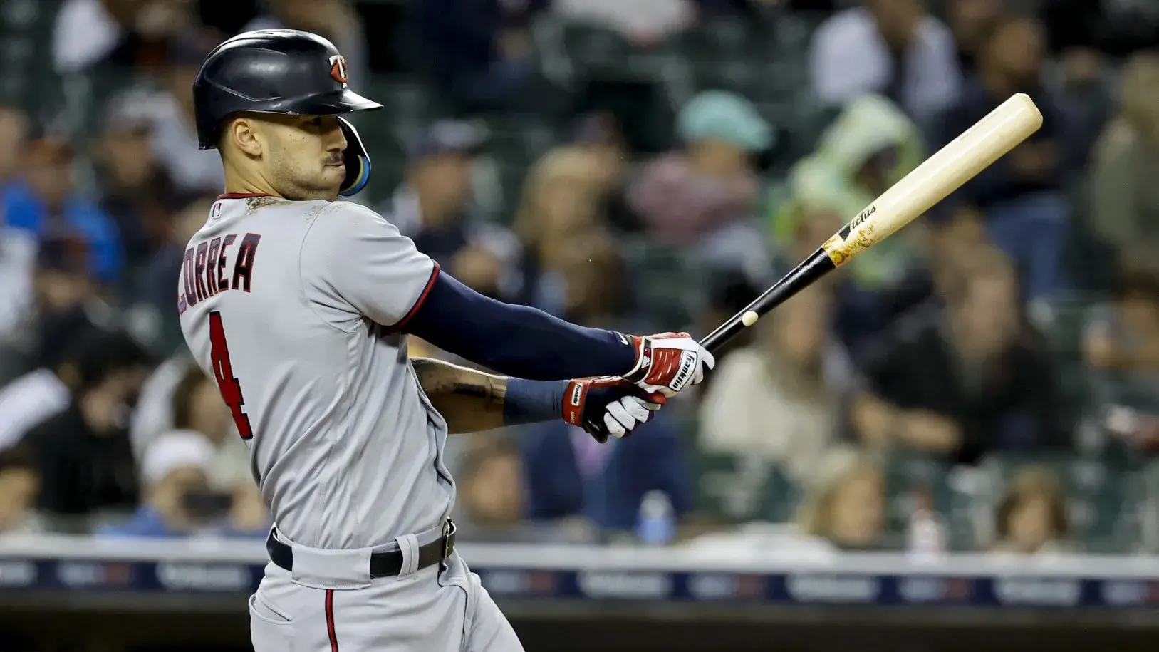 Sep 30, 2022; Detroit, Michigan, USA; Minnesota Twins shortstop Carlos Correa (4) hits a single in the fifth inning against the Detroit Tigers at Comerica Park / Rick Osentoski-USA TODAY Sports