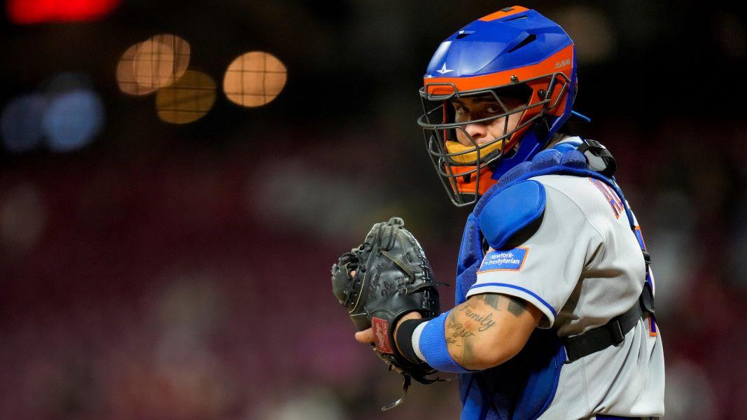 New York Mets catcher Francisco Alvarez (4) looks to the dugout for a signal in the eighth inning of the MLB National League game between the Cincinnati Reds and the New York Mets at Great American Ball Park in downtown Cincinnati on Tuesday, May 9, 2023.