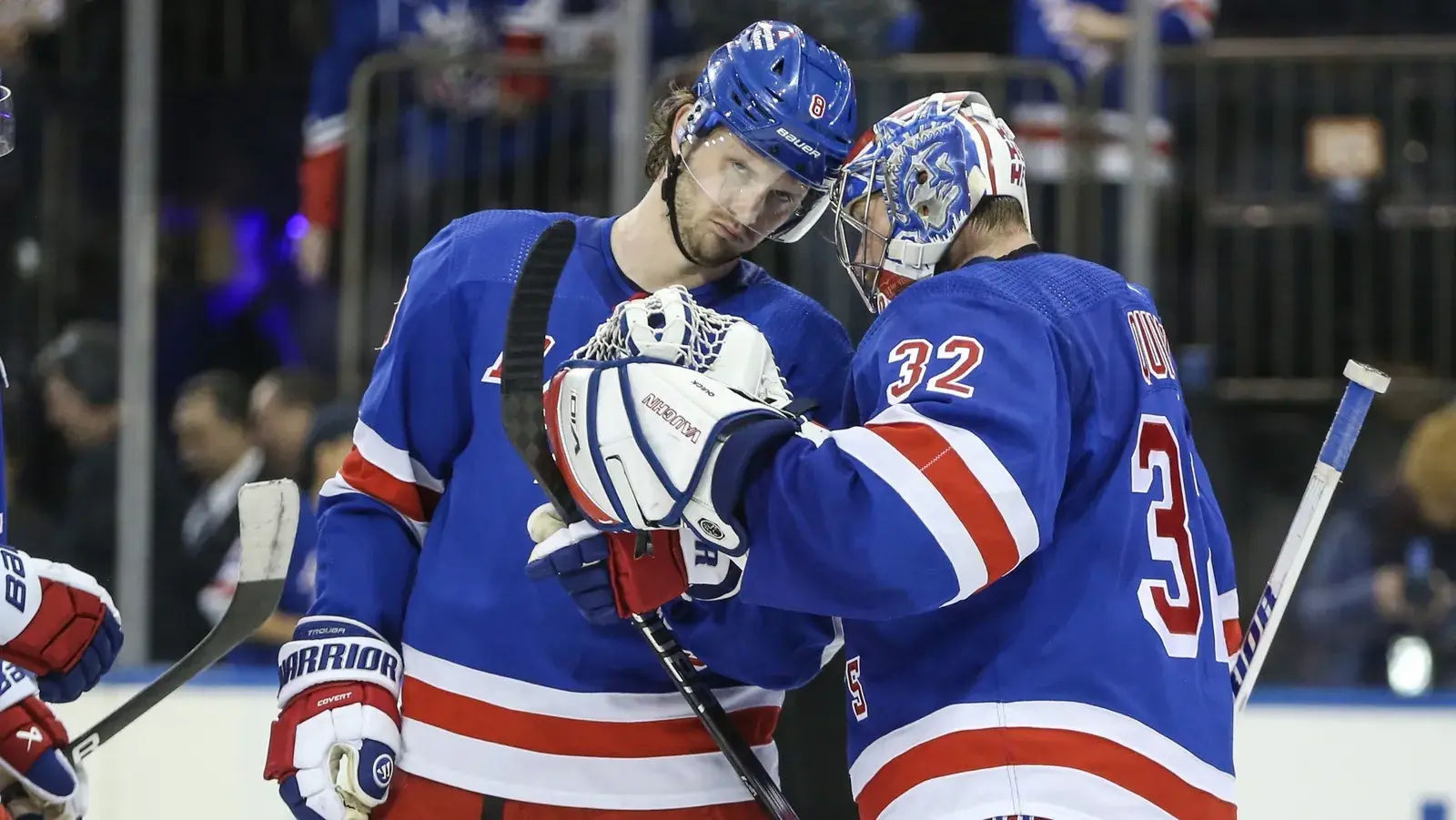 New York Rangers defenseman Jacob Trouba (8) and goaltender Jonathan Quick (32) celebrate after defeating the Montreal Canadiens 7-4 at Madison Square Garden. / Wendell Cruz-USA TODAY Sports