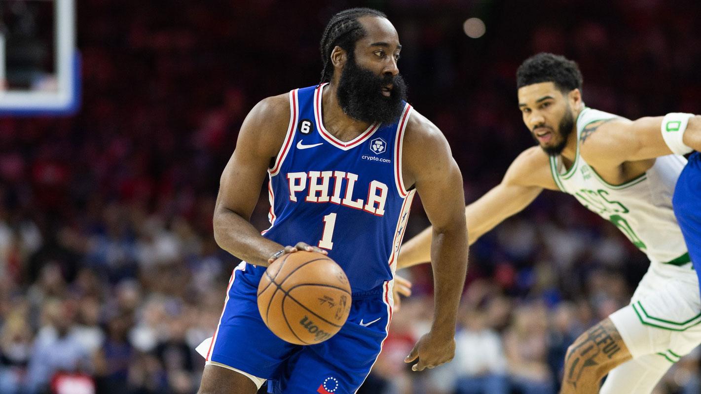 May 11, 2023; Philadelphia, Pennsylvania, USA; Philadelphia 76ers guard James Harden (1) dribbles the ball past center Joel Embiid (21) and Boston Celtics forward Jayson Tatum (0) during the first quarter in game six of the 2023 NBA playoffs at Wells Fargo Center.