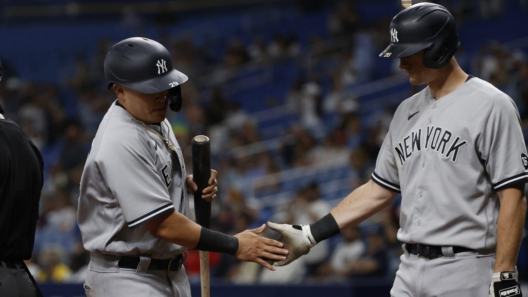 Jul 28, 2021; St. Petersburg, Florida, USA; New York Yankees third baseman Gio Urshela (29) scores a run during the tenth inning against the Tampa Bay Rays at Tropicana Field. / Kim Klement-USA TODAY Sports