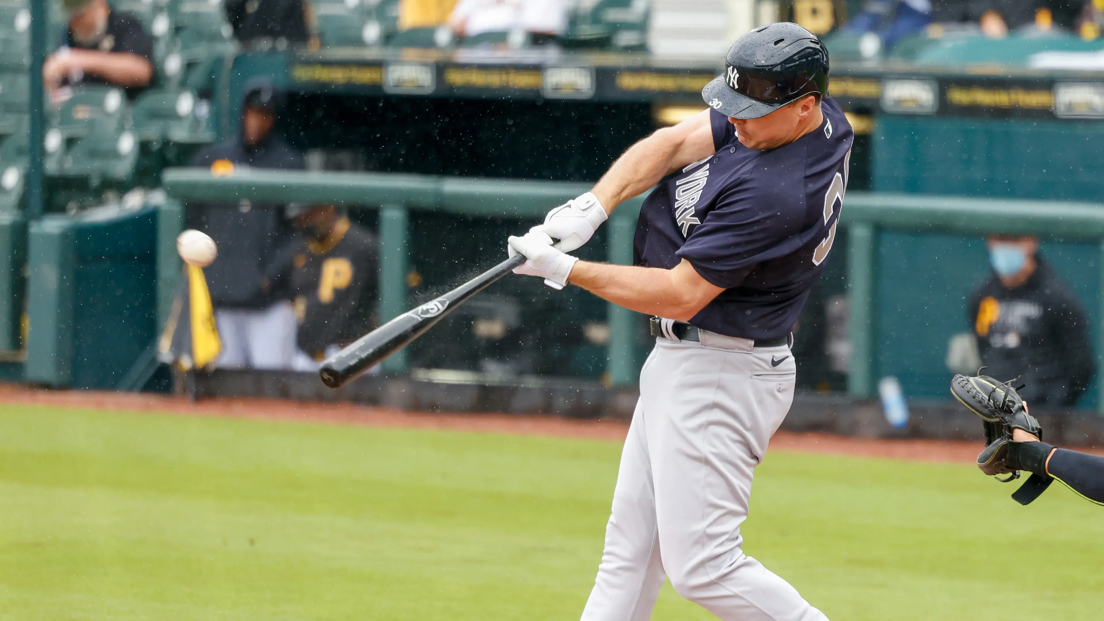 Mar 6, 2021; Bradenton, Florida, USA; New York Yankees right fielder Jay Bruce (30) hits a home run in the top of the first inning during spring training at LECOM Park. / Nathan Ray Seebeck-USA TODAY Sports