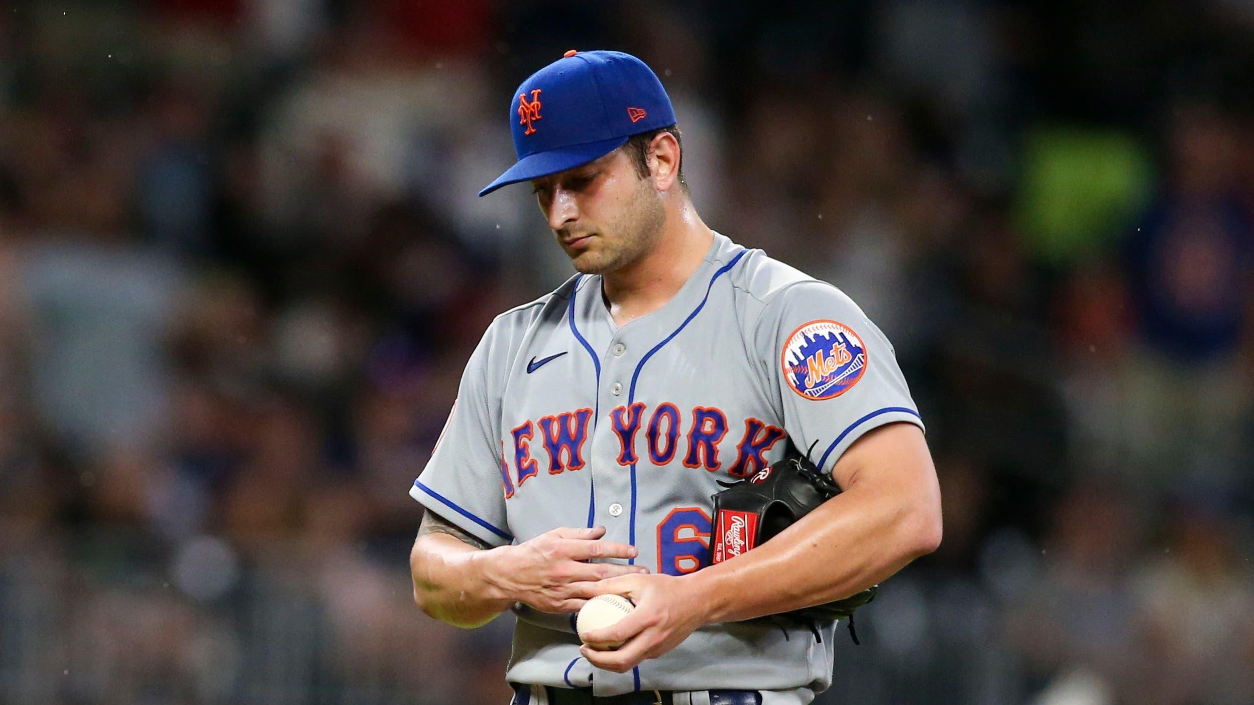 Jun 30, 2021; Atlanta, Georgia, USA; New York Mets relief pitcher Thomas Szapucki (63) shows emotion after giving up a home run to Atlanta Braves second baseman Ozzie Albies (not pictured) in the fifth inning at Truist Park. / Brett Davis-USA TODAY Sports