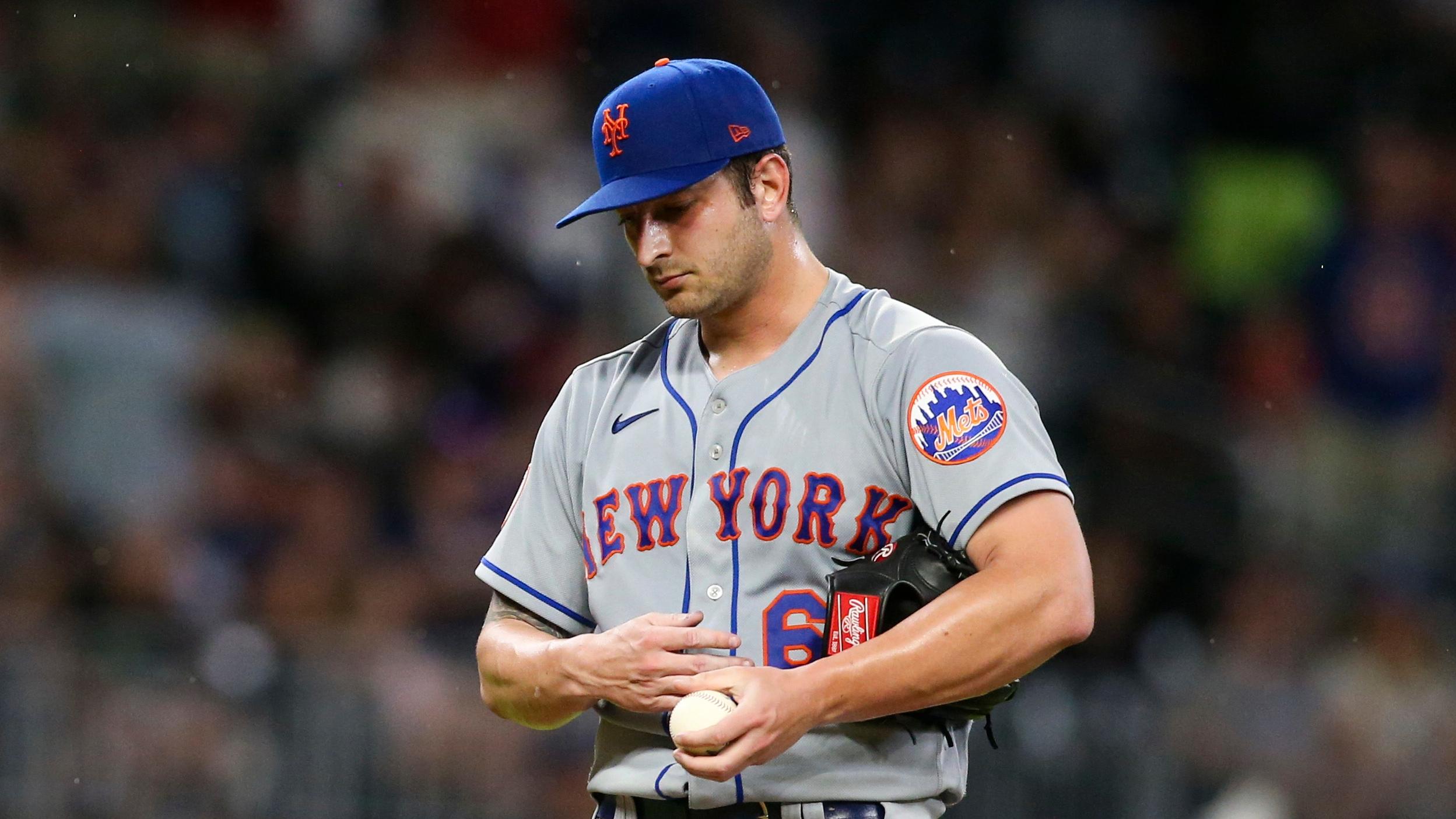 Jun 30, 2021; Atlanta, Georgia, USA; New York Mets relief pitcher Thomas Szapucki (63) shows emotion after giving up a home run to Atlanta Braves second baseman Ozzie Albies (not pictured) in the fifth inning at Truist Park.