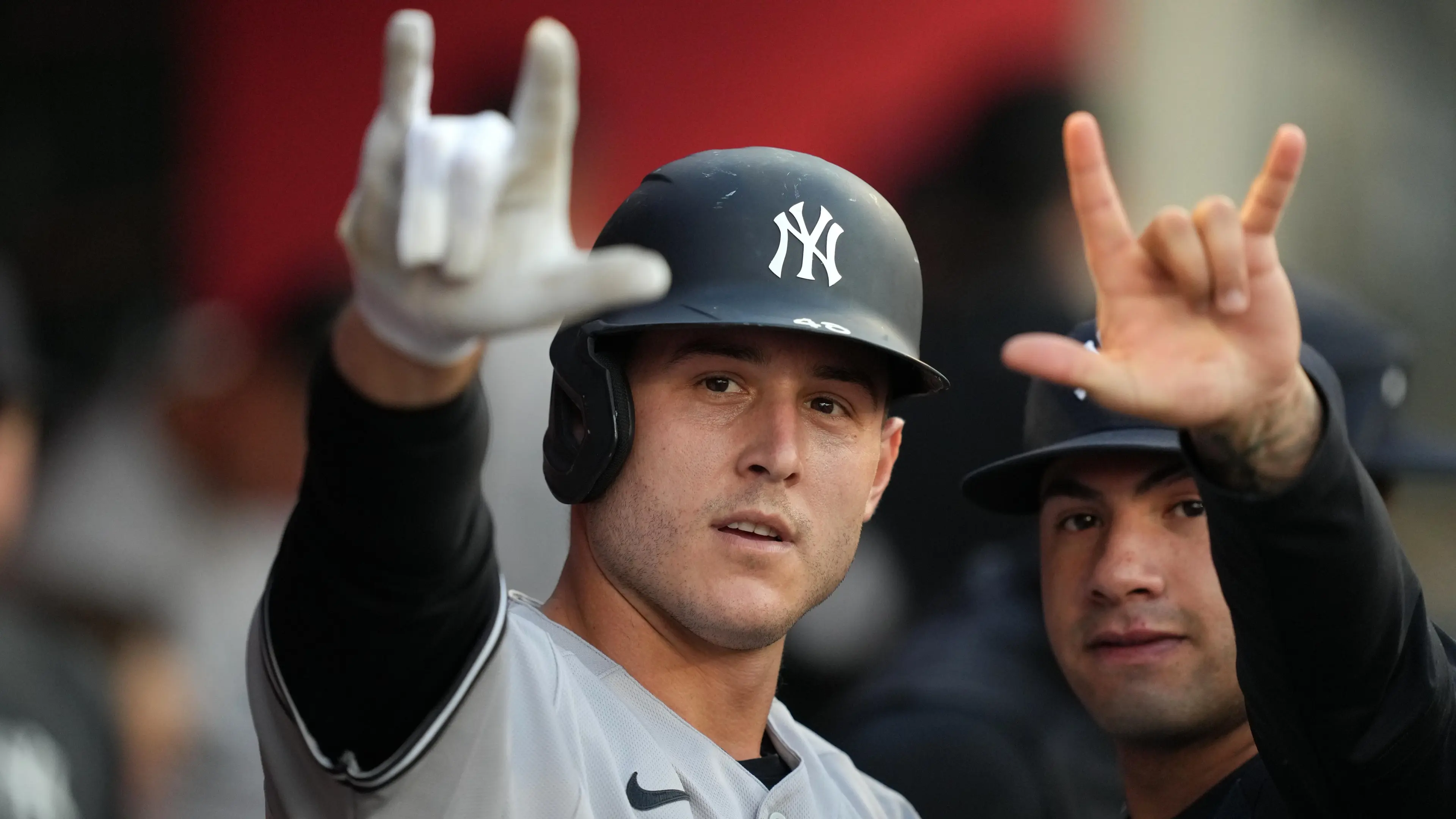 Aug 30, 2022; Anaheim, California, USA; New York Yankees first baseman Anthony Rizzo (48) celebrates after hitting a solo home run in the second inning as Los Angeles Angels catcher Max Stassi (33) wqtches at Angel Stadium. Mandatory Credit: Kirby Lee-USA TODAY Sports / © Kirby Lee-USA TODAY Sports