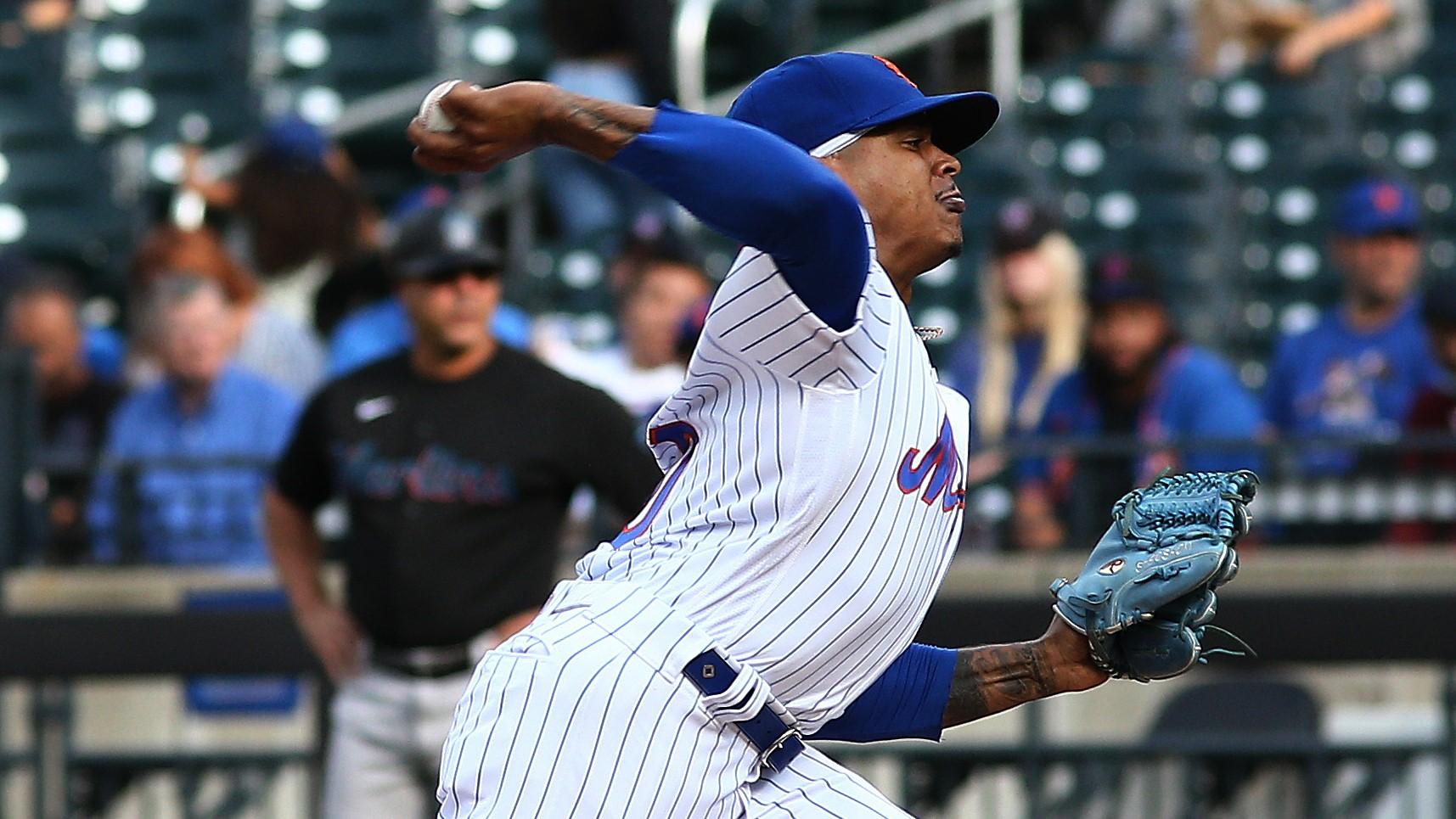 Sep 28, 2021; New York City, New York, USA; New York Mets starting pitcher Marcus Stroman (0) pitches against the Miami Marlins during the first inning of game one of a doubleheader at Citi Field. Mandatory Credit: Andy Marlin-USA TODAY Sports