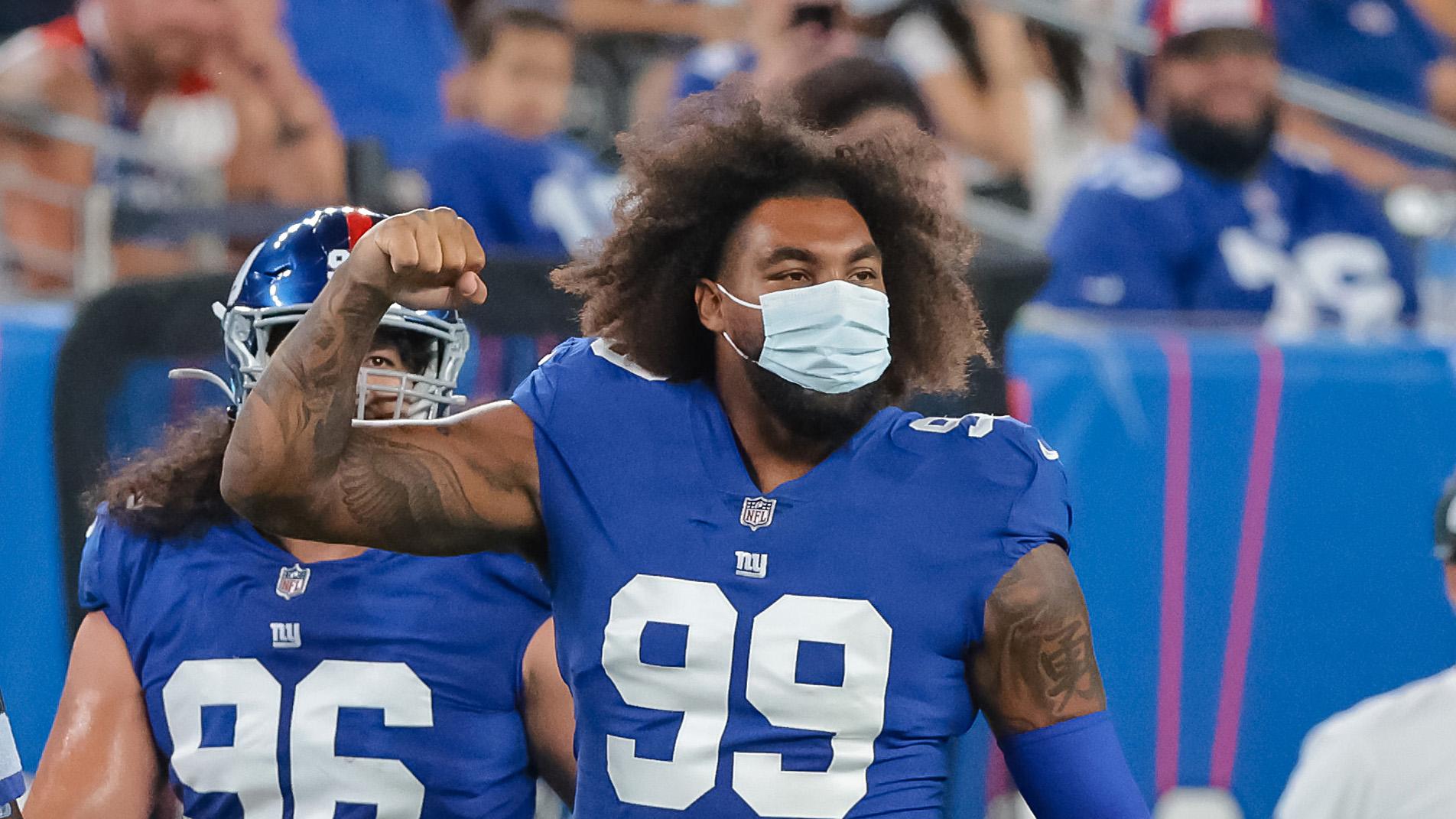 New York Giants defensive end Leonard Williams (99) reacts after a defensive stop against the New York Jets during the first half at MetLife Stadium.