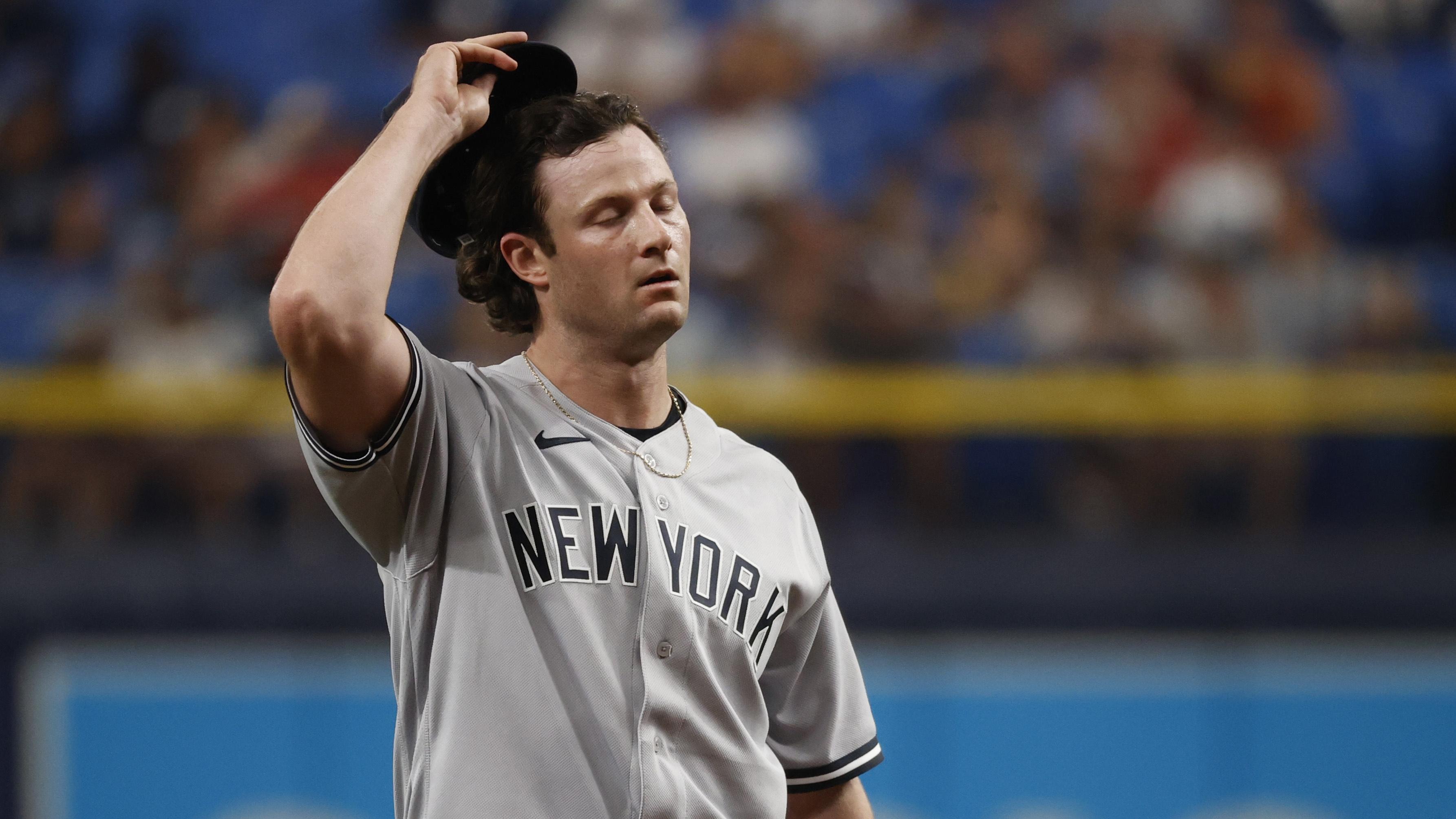 Jul 29, 2021; St. Petersburg, Florida, USA; New York Yankees starting pitcher Gerrit Cole (45) reacts on the mound during the first inning against the Tampa Bay Rays at Tropicana Field.