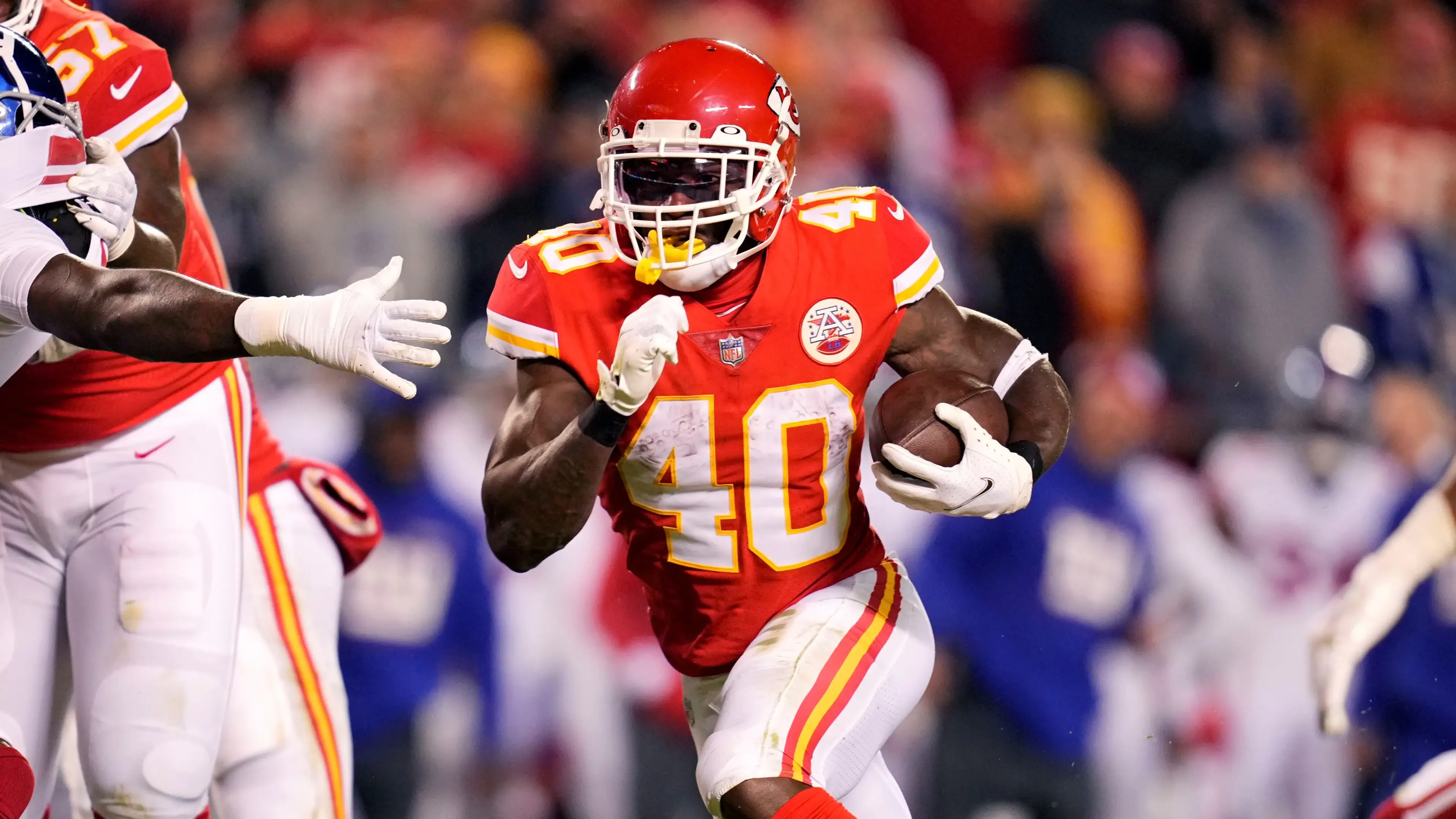 Nov 1, 2021; Kansas City, Missouri, USA; Kansas City Chiefs running back Derrick Gore (40) runs the ball past New York Giants linebacker Tae Crowder (48) during the first half at GEHA Field at Arrowhead Stadium. Mandatory Credit: Jay Biggerstaff-USA TODAY Sports / Jay Biggerstaff-USA TODAY Sports