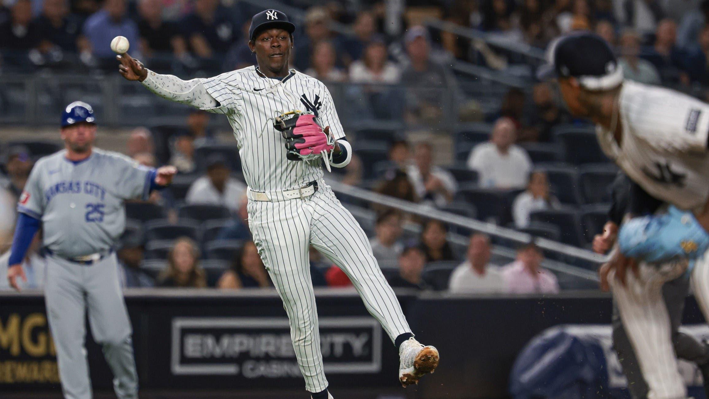 Sep 10, 2024; Bronx, New York, USA; New York Yankees third baseman Jazz Chisholm Jr. (13) throws the ball first base during the fifth inning against the Kansas City Royals at Yankee Stadium. / Vincent Carchietta-Imagn Images