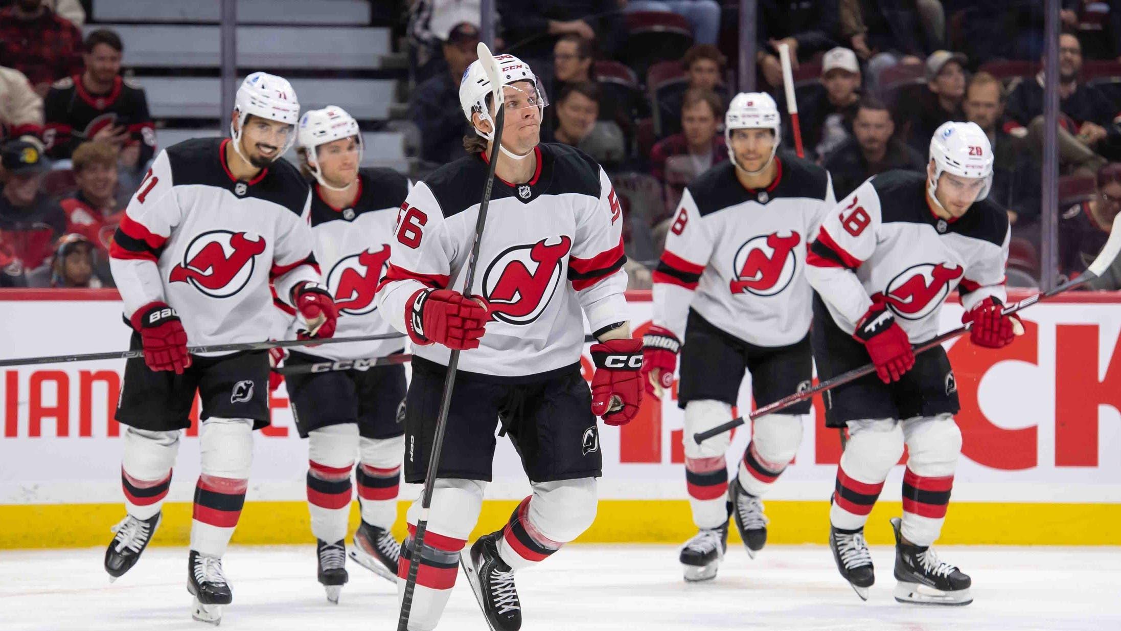 New Jersey Devils left wing Erik Haula (56) skates to the bench after scoring a goal in the second period against the Ottawa Senators at the Canadian Tire Centre. / Marc DesRosiers-Imagn Images