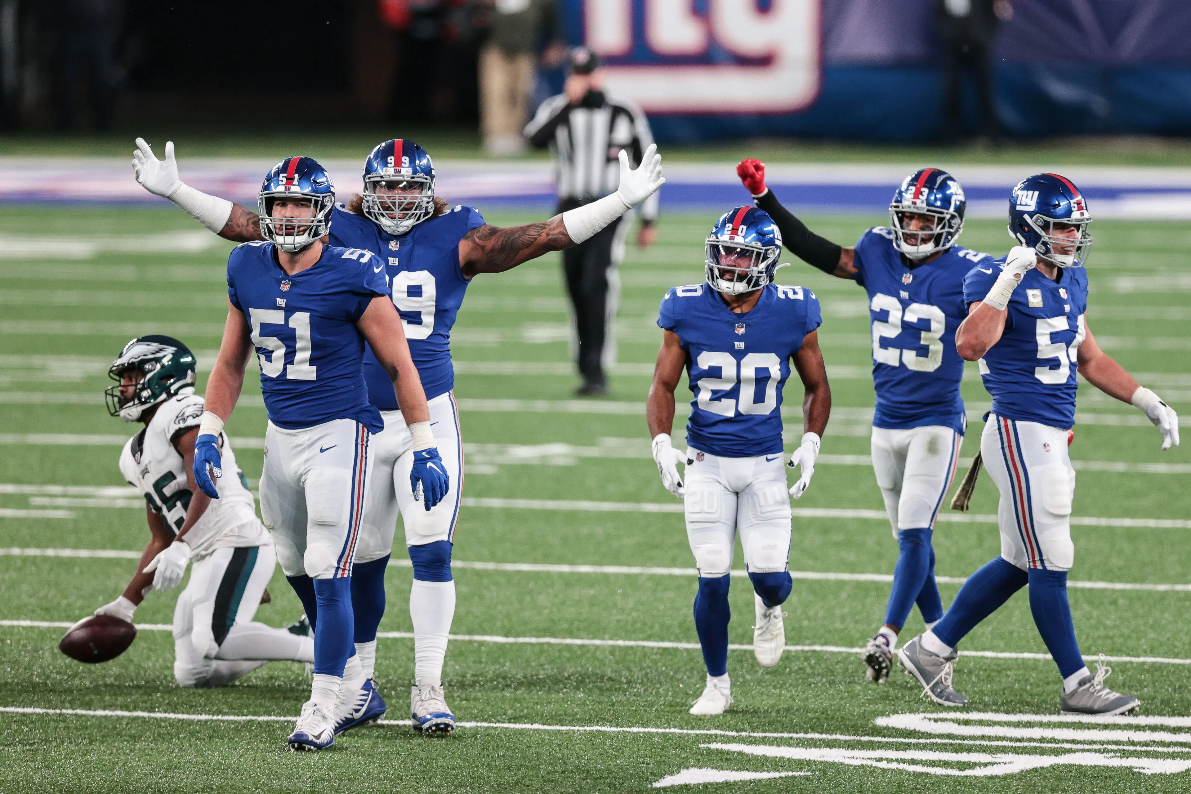 Nov 15, 2020; East Rutherford, New Jersey, USA; New York Giants linebacker Kyler Fackrell (51) and defensive end Leonard Williams (99) and cornerback Julian Love (20) and cornerback Logan Ryan (23) and linebacker Blake Martinez (54) celebrate a defensive stop during the fourth quarter at MetLife Stadium. Mandatory Credit: Vincent Carchietta-USA TODAY Sports / © Vincent Carchietta-USA TODAY Sports