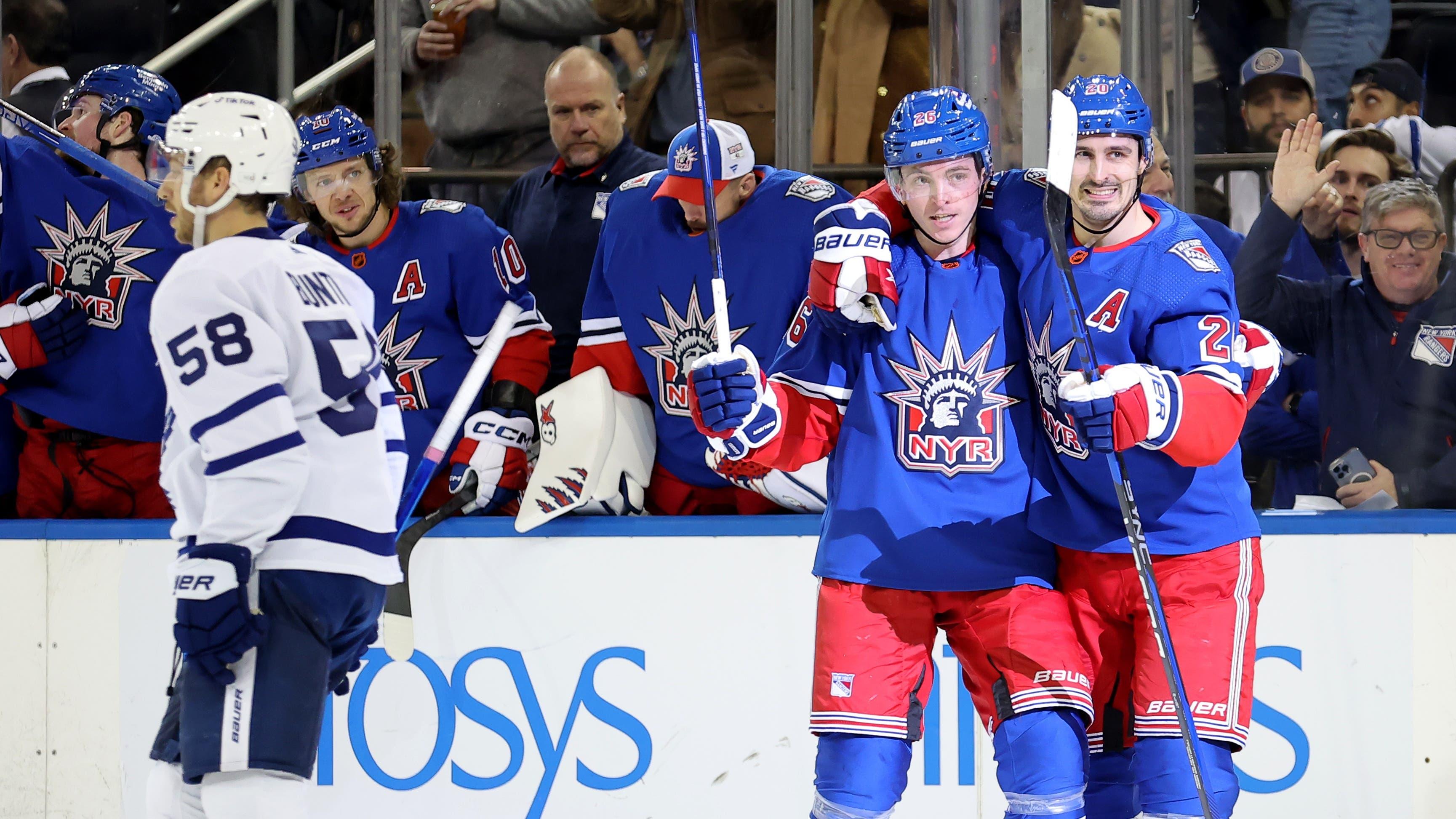 New York Rangers left wing Jimmy Vesey (26) celebrates his goal against the Toronto Maple Leafs with left wing Chris Kreider (20) during the second period at Madison Square Garden / Brad Penner - USA TODAY Sports