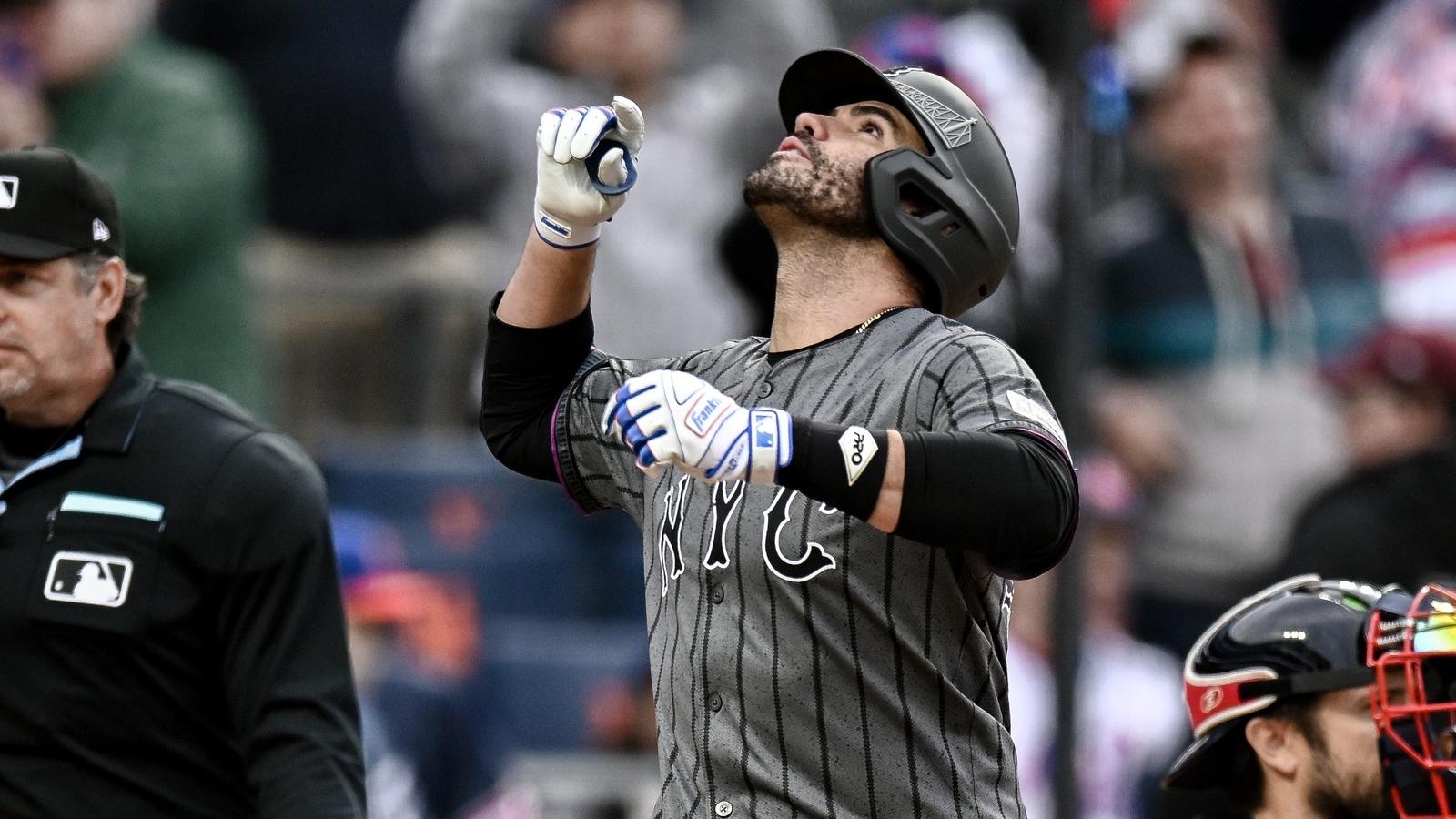 New York Mets designated hitter J.D. Martinez (28) reacts after hitting a solo home run against the Atlanta Braves during the ninth inning at Citi Field.