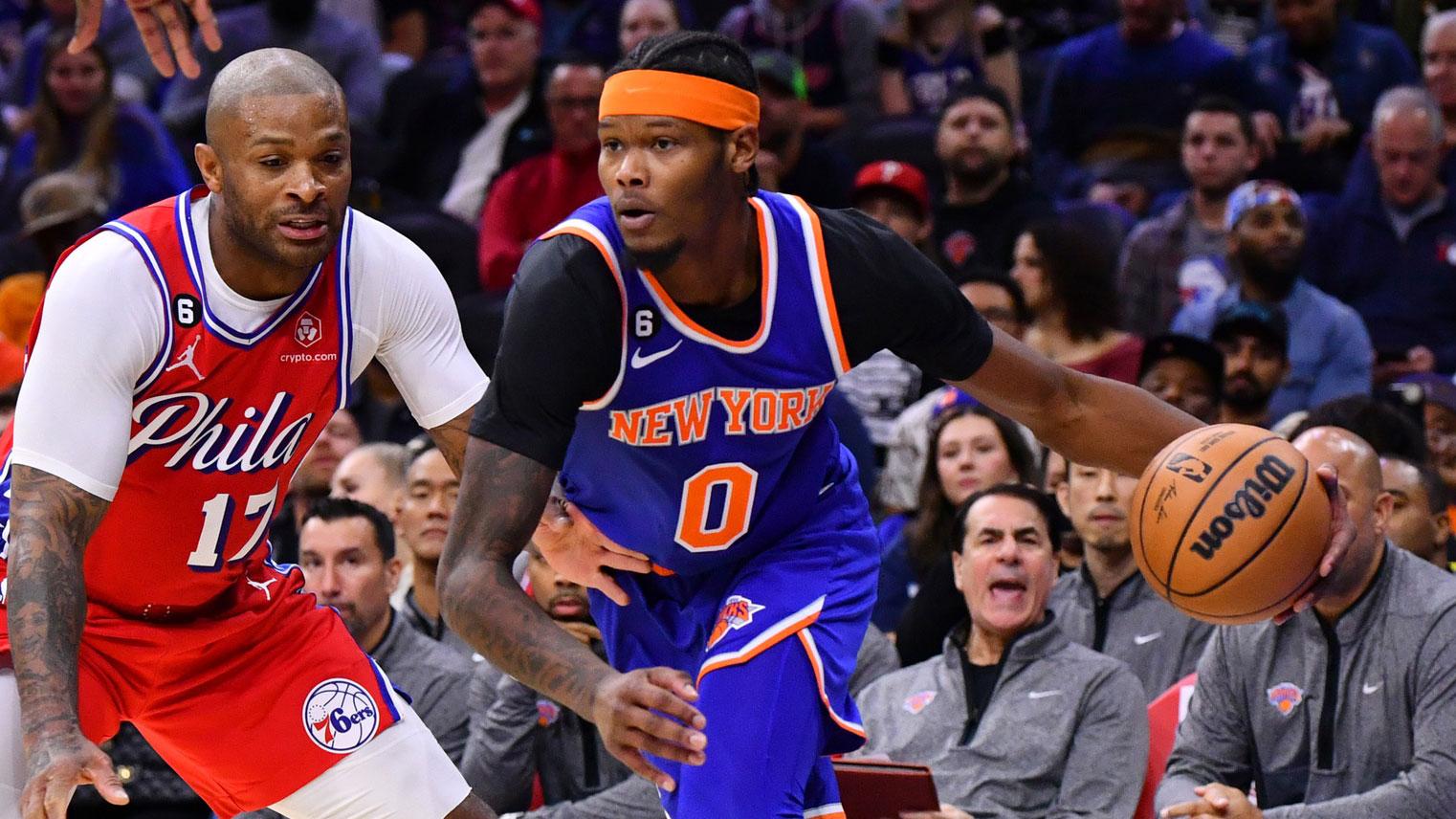 Nov 4, 2022; Philadelphia, Pennsylvania, USA; New York Knicks forward Cam Reddish (0) drives against Philadelphia 76ers forward P.J. Tucker (17) in the second quarter at Wells Fargo Center.