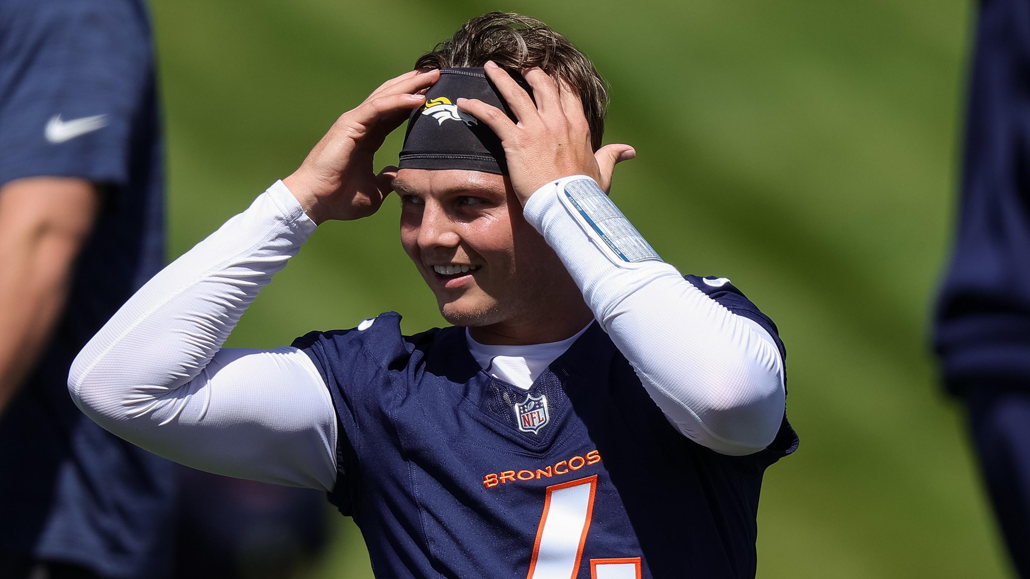 Denver Broncos quarterback Zach Wilson (4) during organized team activities at Centura Health Training Center