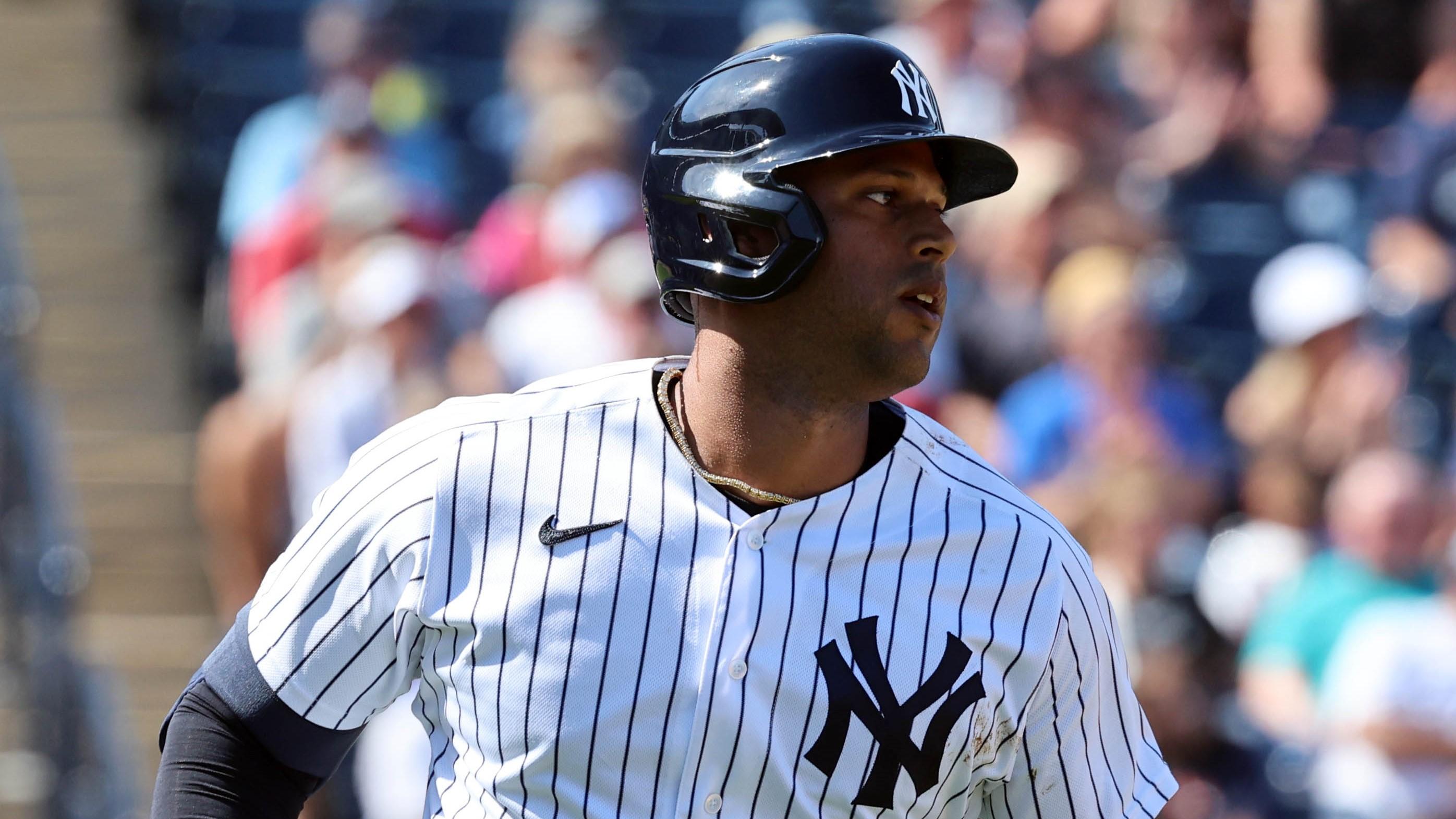 Mar 1, 2023; Tampa, Florida, USA; New York Yankees center fielder Aaron Hicks (31) singles during the fourth inning against the Washington Nationals at George M. Steinbrenner Field. Mandatory Credit: Kim Klement-USA TODAY Sports