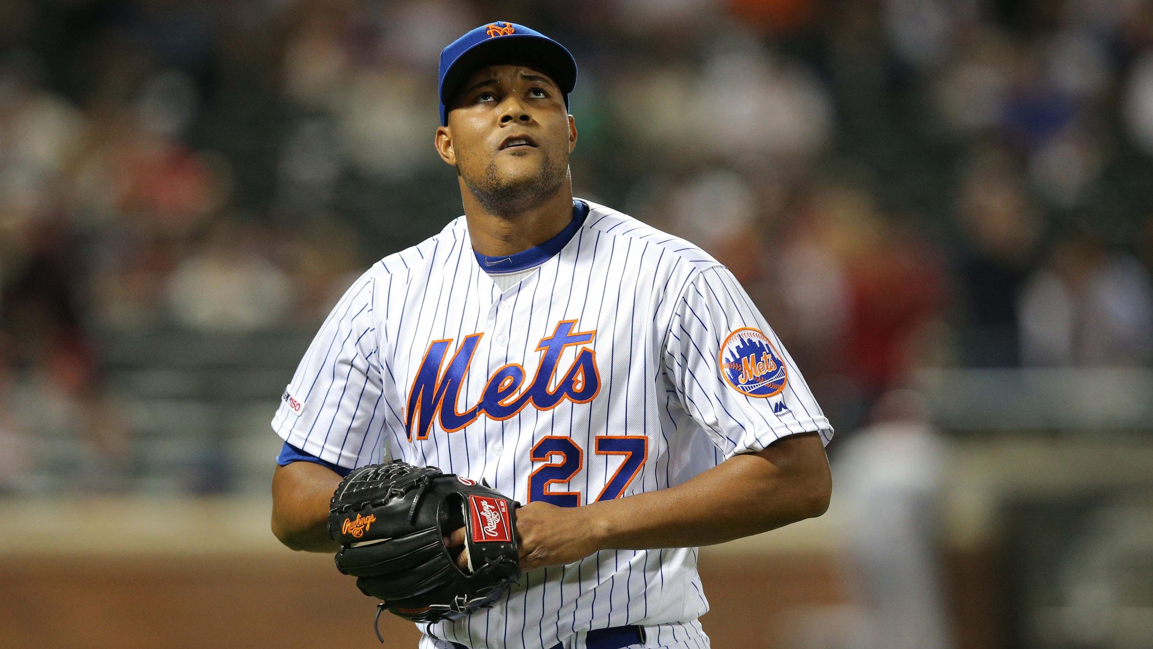 New York Mets relief pitcher Jeurys Familia (27) reacts after allowing the St. Louis Cardinals to score four runs during the eighth inning at Citi Field. / Brad Penner-USA TODAY Sports