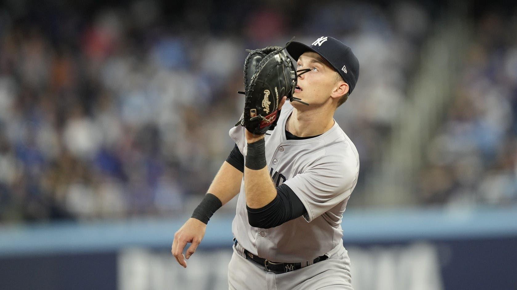 Jun 27, 2024; Toronto, Ontario, CAN; New York Yankees first baseman Ben Rice (93) catches a fly ball hit by Toronto Blue Jays second baseman Isiah Kiner-Falefa (not pictured) during the sixth inning at Rogers Centre. / John E. Sokolowski-USA TODAY Sports