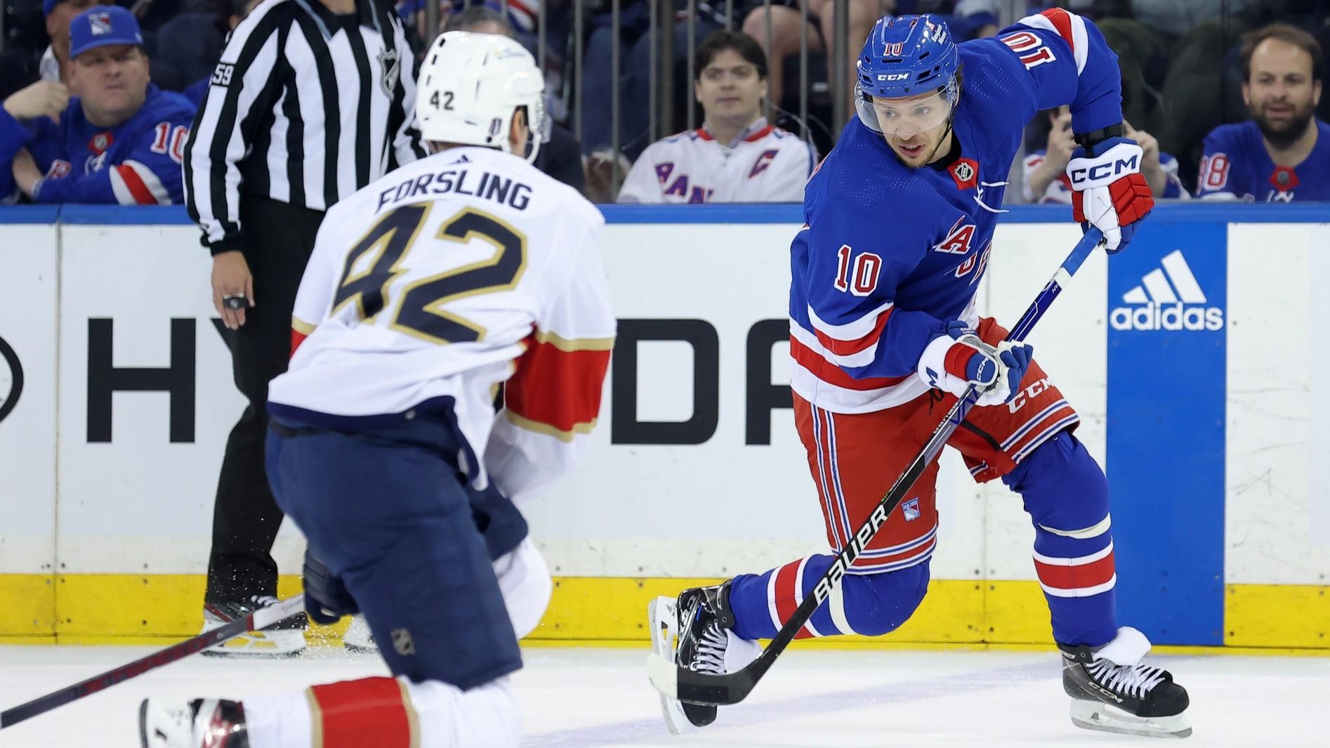 May 22, 2024; New York, New York, USA; New York Rangers left wing Artemi Panarin (10) plays the puck against Florida Panthers defenseman Gustav Forsling (42) during the first period of game one of the Eastern Conference Final of the 2024 Stanley Cup Playoffs at Madison Square Garden.