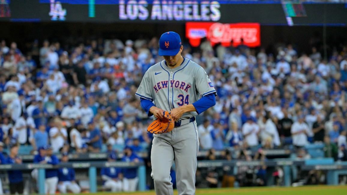 New York Mets pitcher Kodai Senga (34) reacts after being pulled from the mound against the Los Angeles Dodgers in the second inning during game one of the NLCS for the 2024 MLB Playoffs at Dodger Stadium.