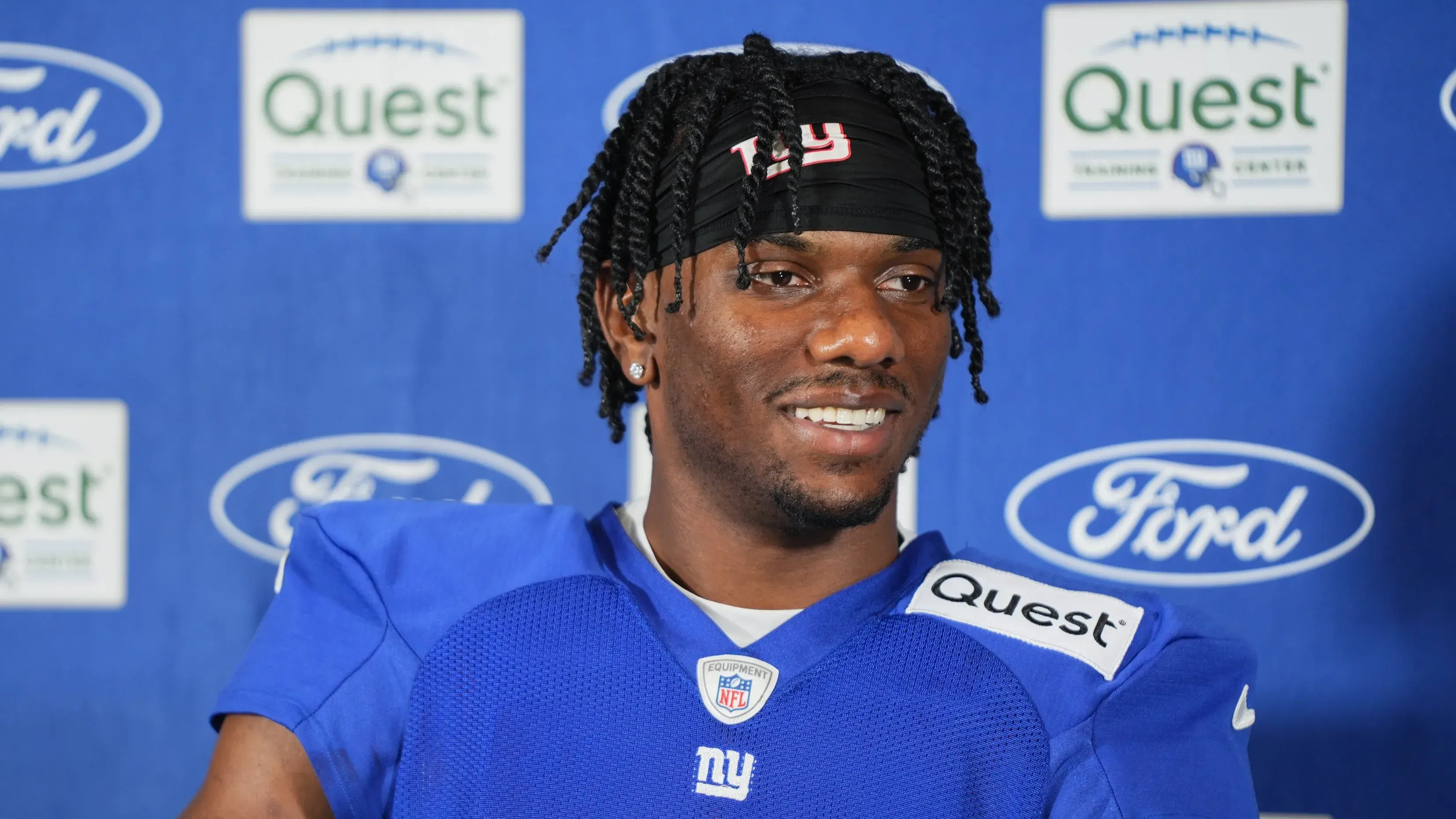 Jul 26, 2024; East Rutherford, NJ, USA; New York Giants wide receiver Malik Nabers (9) speaks at a press conference after training camp at Quest Diagnostics Training Center. / Lucas Boland-USA TODAY Sports