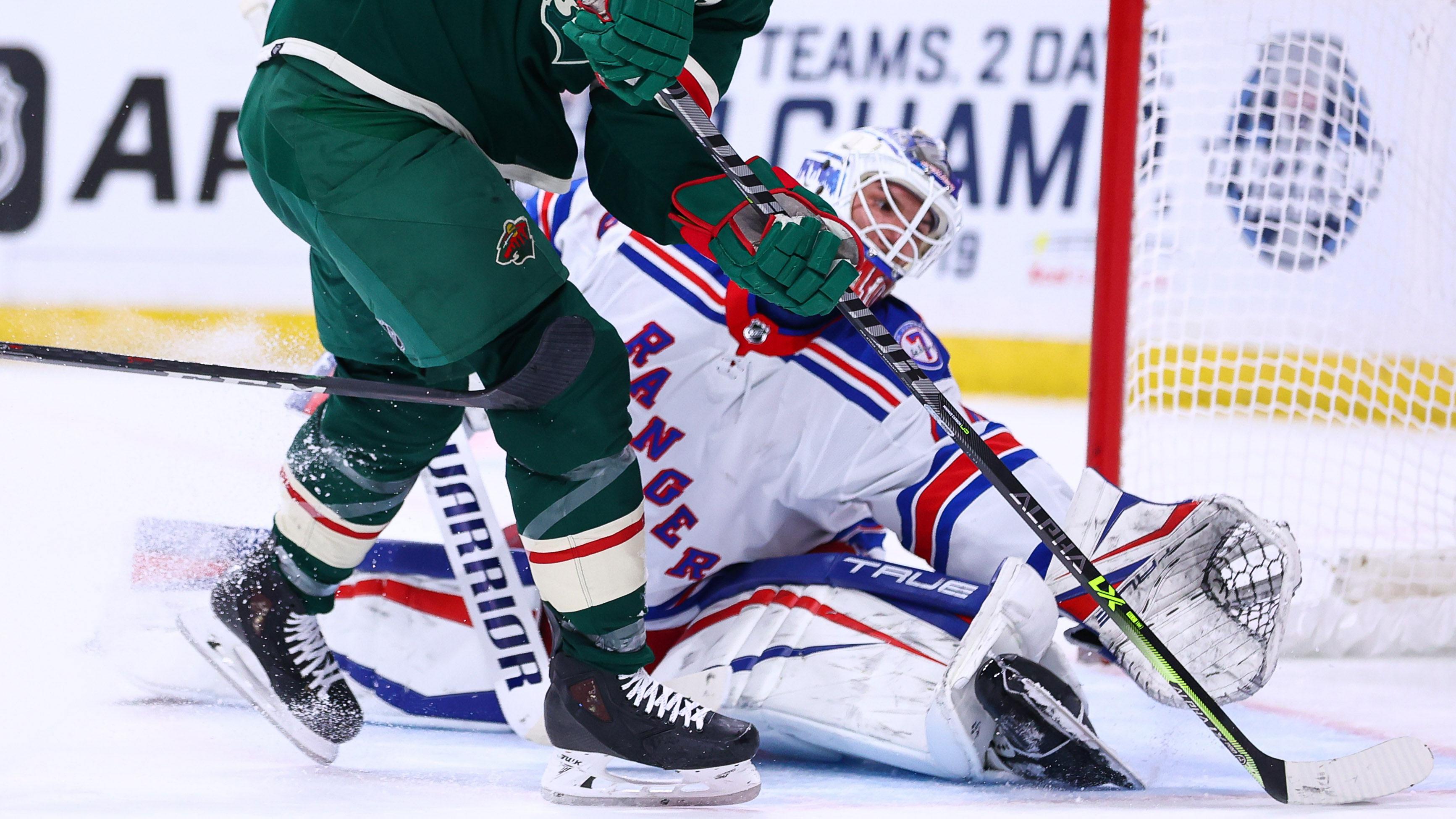 Mar 8, 2022; Saint Paul, Minnesota, USA; Minnesota Wild left wing Marcus Foligno (17) scores a goal against the New York Rangers during the second period at Xcel Energy Center.