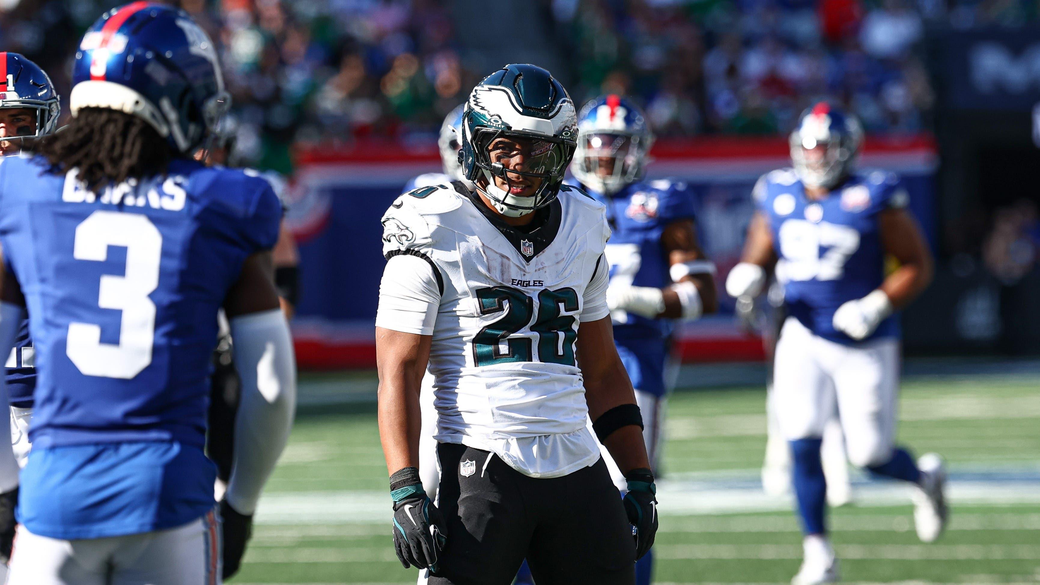 Oct 20, 2024; East Rutherford, New Jersey, USA; Philadelphia Eagles running back Saquon Barkley (26) reacts after a long run during the second half against the New York Giants at MetLife Stadium. Mandatory Credit: Vincent Carchietta-Imagn Images