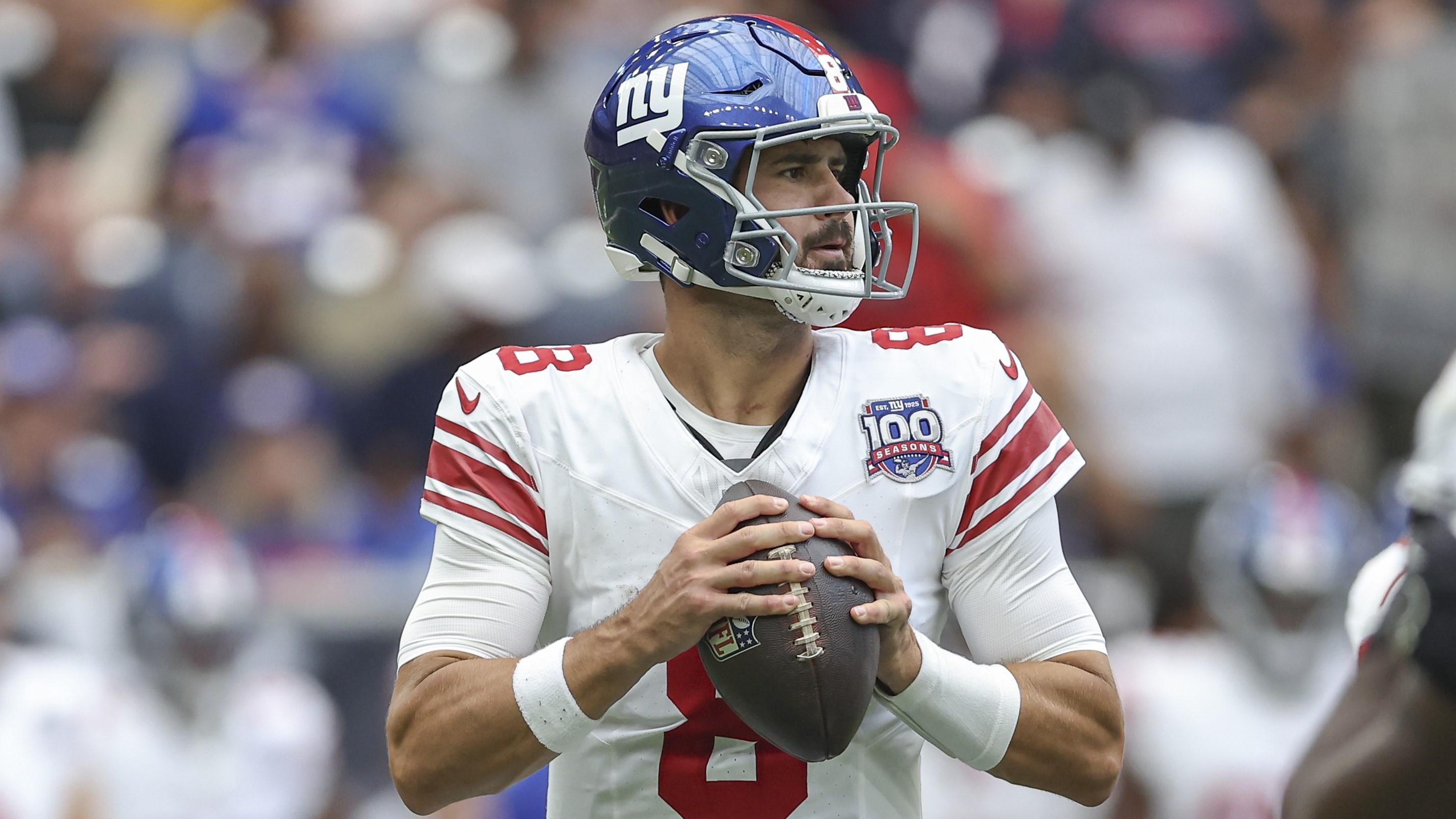 Aug 17, 2024; Houston, Texas, USA; New York Giants quarterback Daniel Jones (8) looks for an open receiver during the second quarter against the Houston Texans at NRG Stadium. Mandatory Credit: Troy Taormina-USA TODAY Sports