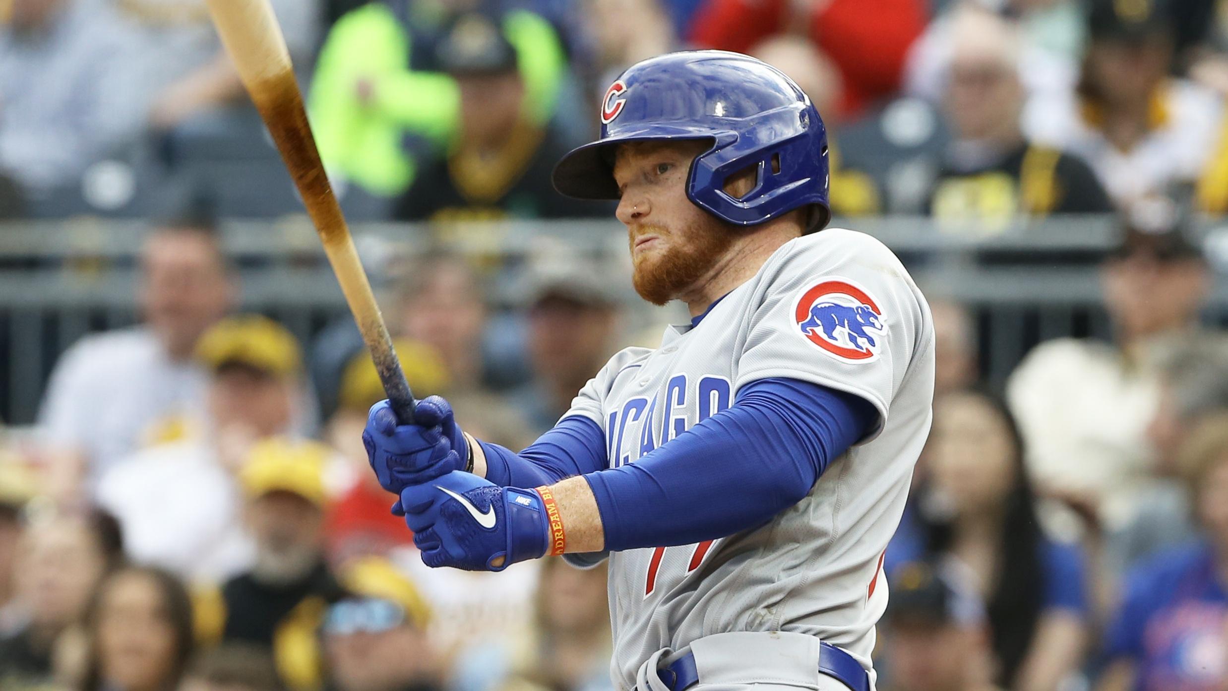 Apr 12, 2022; Pittsburgh, Pennsylvania, USA; Chicago Cubs designated hitter Clint Frazier (77) hits a double against the Pittsburgh Pirates during the sixth inning at PNC Park. Mandatory Credit: Charles LeClaire-USA TODAY Sports