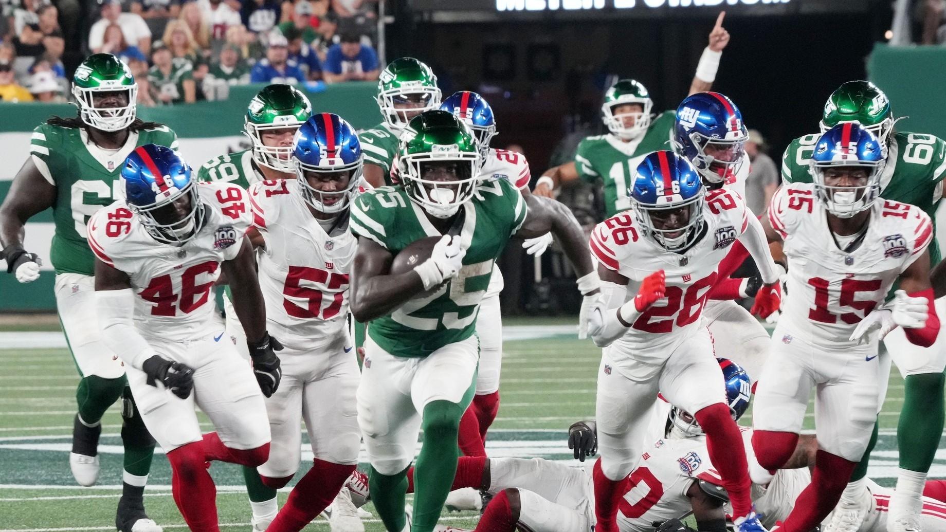 Israel Abanikanda of the Jets runs for a TD in the first half. The New York Giants and New York Jets meet at MetLife Stadium in the final preseason game of the 2024 season for both teams